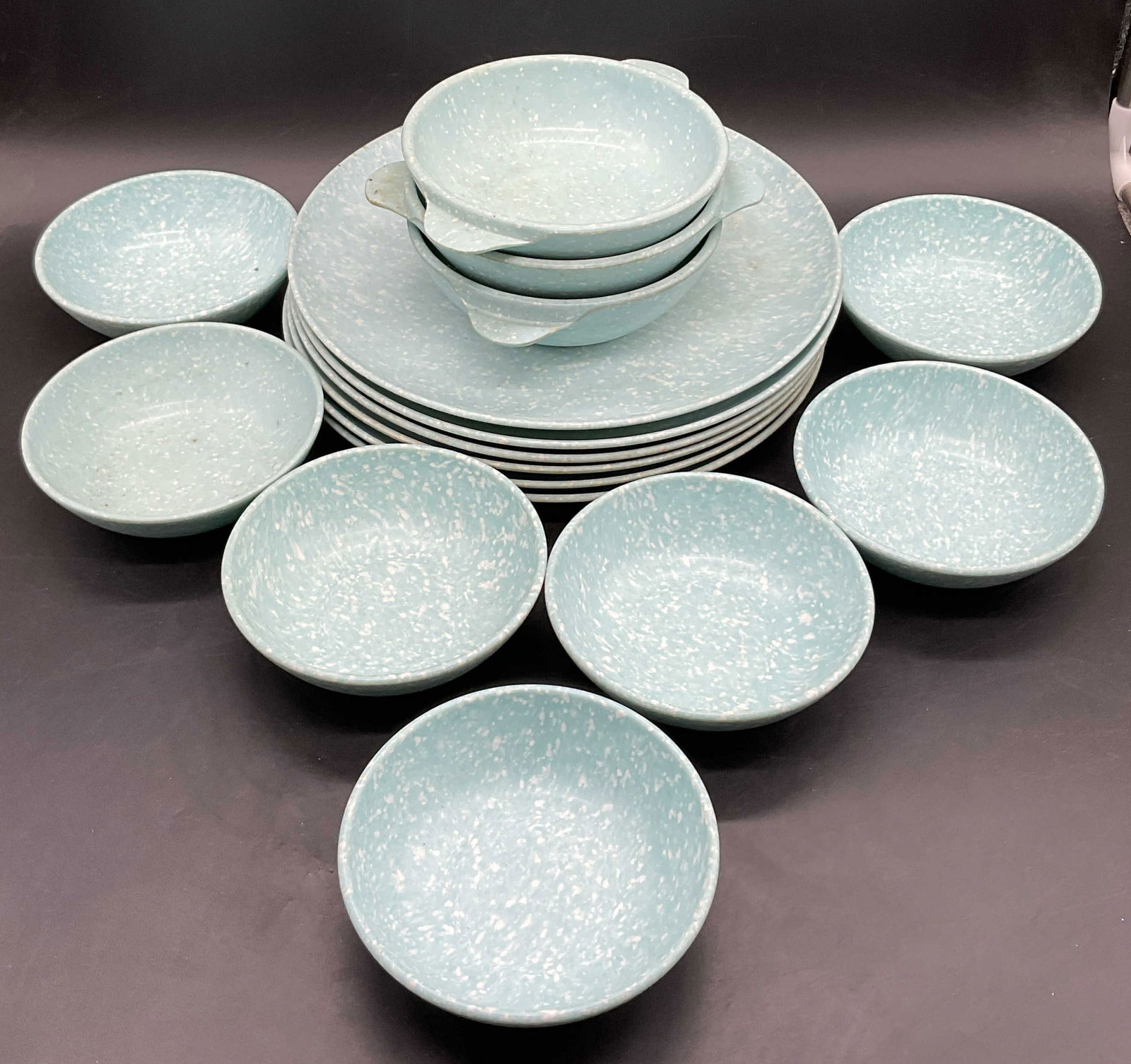 Set 16 Vintage Speckled Blue Melamine Dinnerware: Set 16 Vintage Speckled Blue Melamine Dinnerware. Blue and white hues throughout. Includes plates and bowls. The plates measure approx. 9.75L x 9.75W in. Surface wear and residue present. home decor,