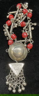 Vtg Silver Tn Red Beaded Pendant Necklace: Vintage silver tone and red beaded pendant necklace. Drop length approx 14 inches. Pendant approx 5.25 inches long. Some wear including scratching observed. Some pieces need replacement. Jewelry, esta