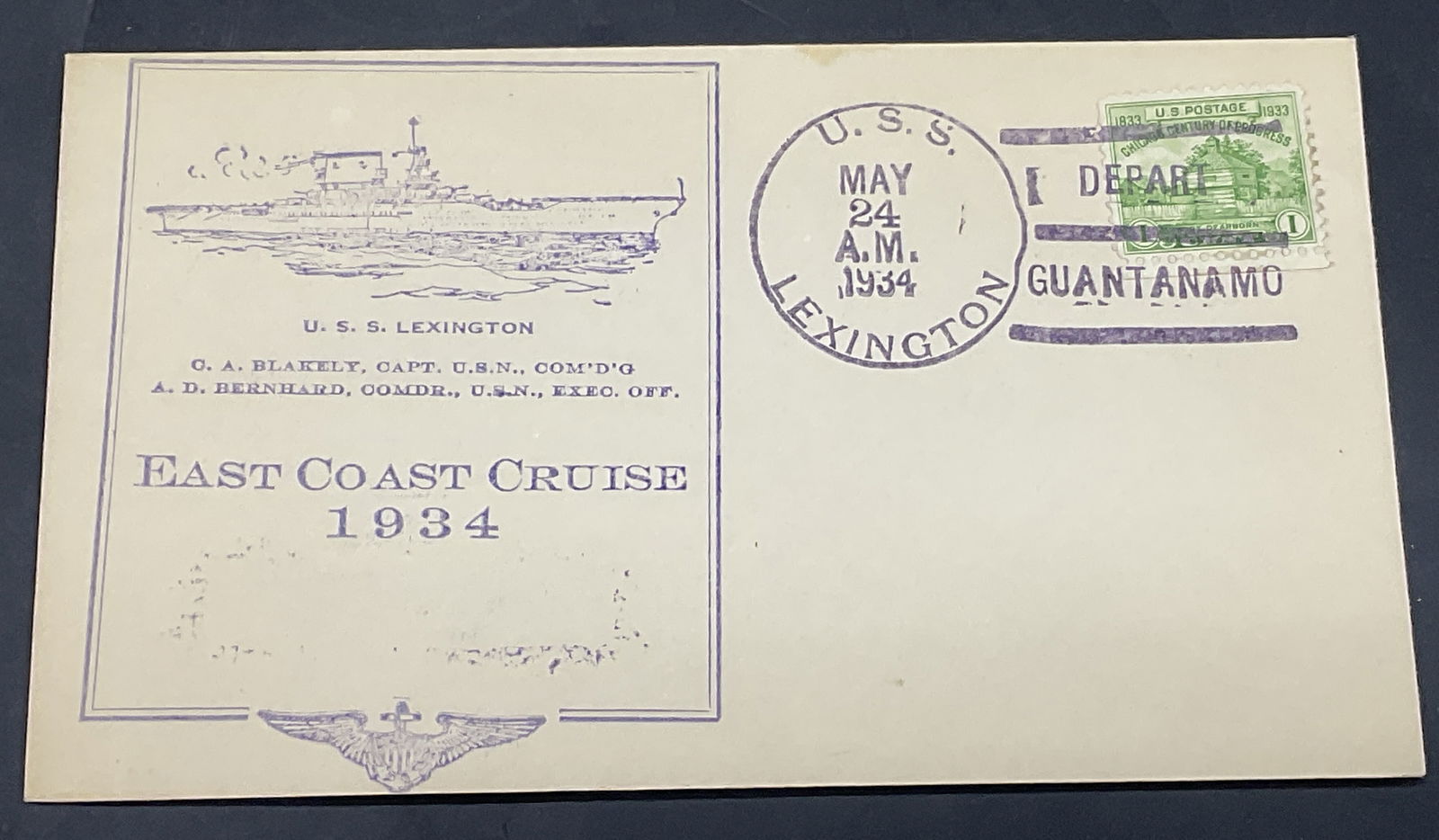 USS Lexington East Coast Cruise Ship1934 Envelope: Envelope reads USS Lexington East Coast Cruise in 1934, postmarked May 24, 1934, from Guantanamo. Measures approx. 6W x 3.5L in. The USS Lexington is a ship. Surface wear, discoloration, and wear to p