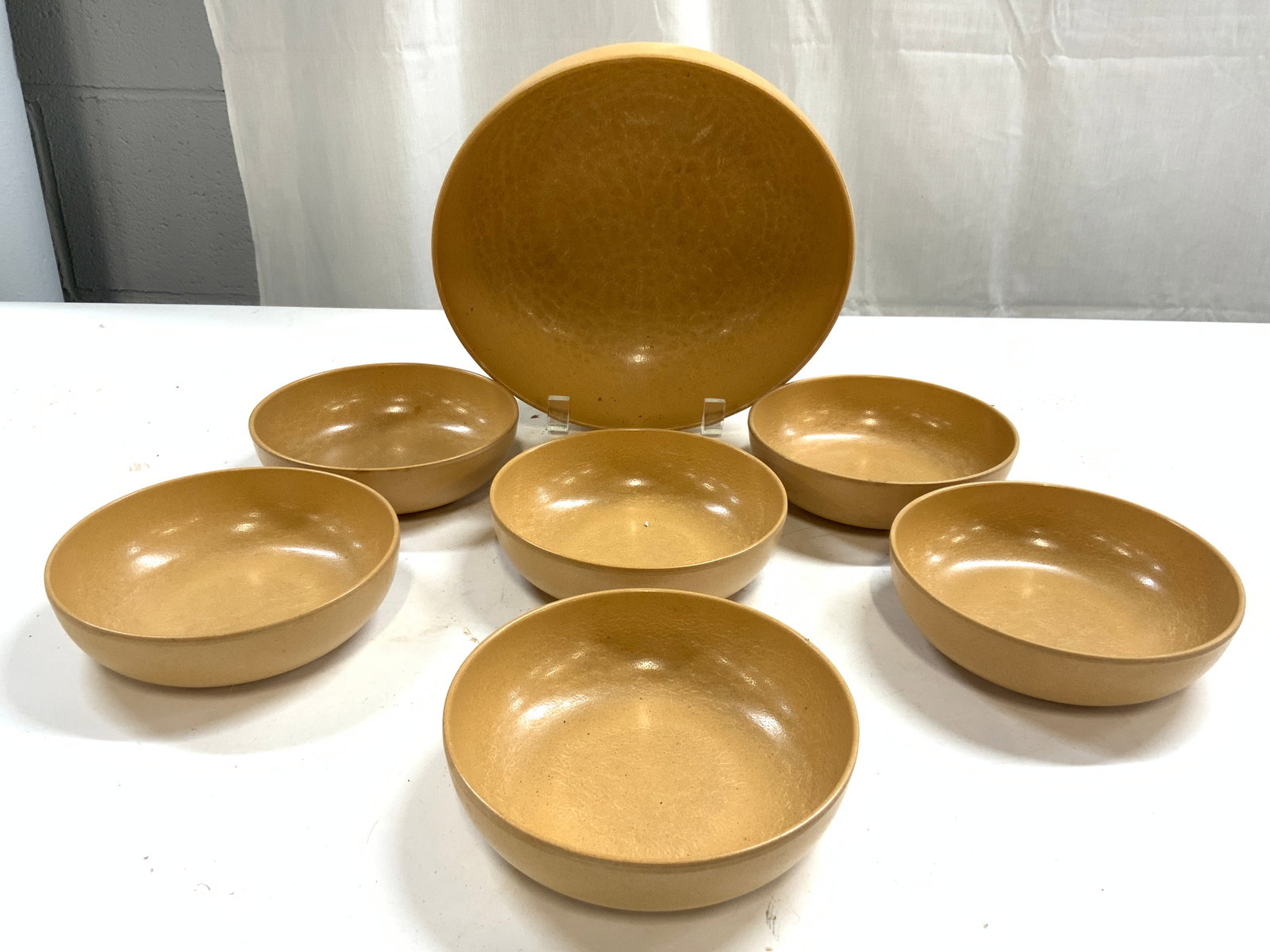 ELLINGERS AGATIZED WOOD Set 7 MCM Bowls: Undersides are trademarked ELLINGERS & read AGATIZED WOOD. Lot includes 1 large bowls & 6 small bowls. Each are sand toned. Largest bowl measures approximately 9.25 inches diameter 3 inches tall. Bowl