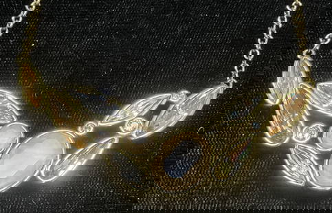 Swarovski Touchstone Gold Tn Crystal Necklace: Touchstone by Swarovski gold tone pendant necklace. Colorless and amber toned Swarovski crystals. Signed on hand tag. Drop length approx 7.75 inches. Includes box. Some wear including scratching. Jewe