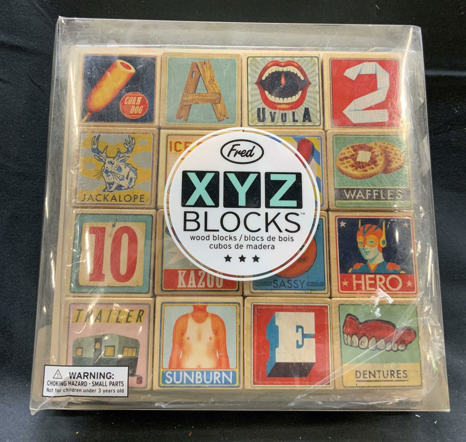 XYZ Wood ABC Blocks by Fred NIP: XYZ Wood ABC Blocks by Fred. Wooden alphabet blocks, including 16 blocks with 26 letters, 52 illustrated words, 11 numbers & 6 moods. Small square blocks are made out of wood. Seems to be potentially