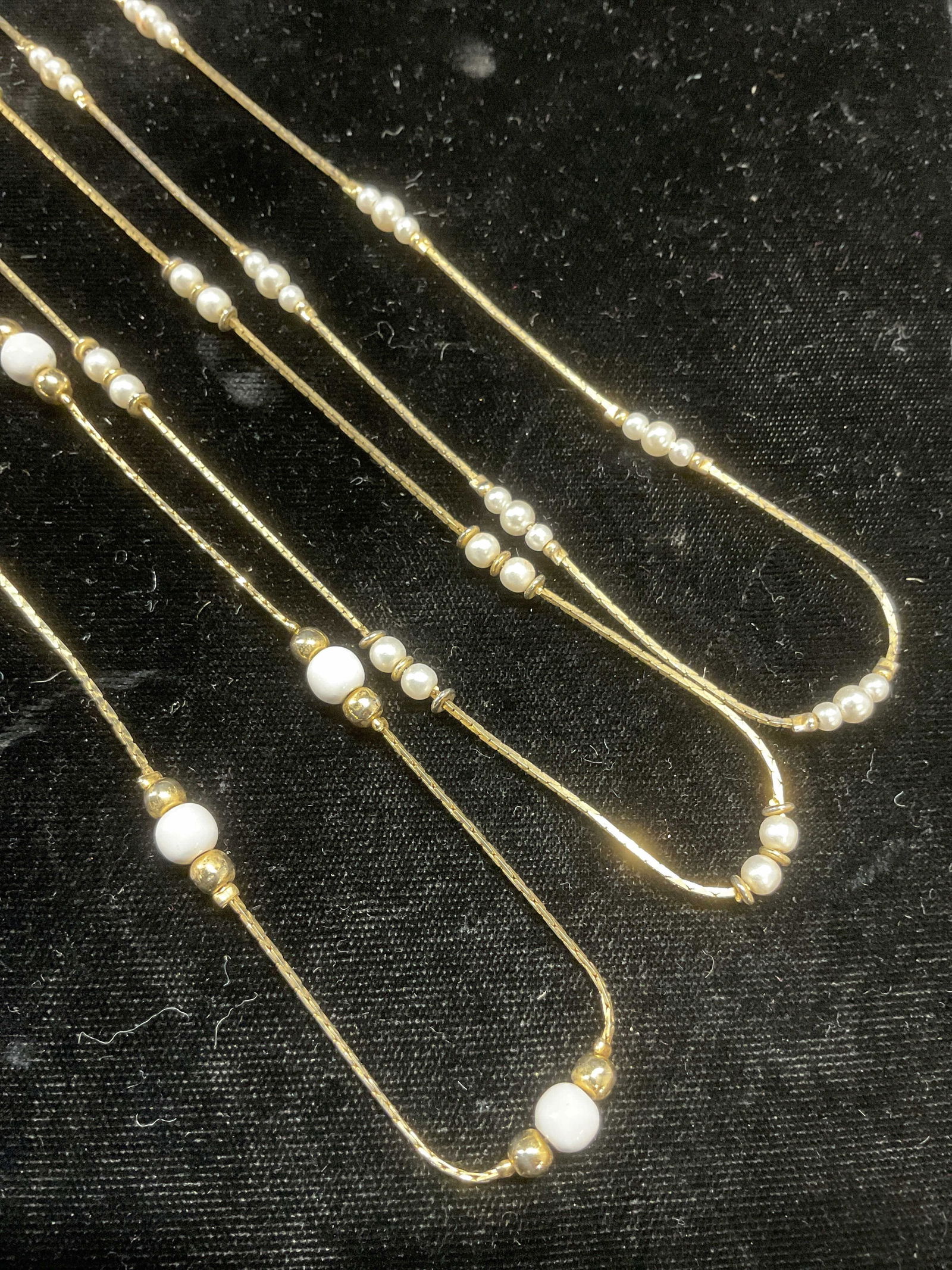 Lot 3 Vintage Gold Tn Faux Pearl Necklaces: Lot of 3 vintage gold tone faux pearl beaded necklaces. Drop length approx 11.75 inches each. Some wear to all including scratching observed. Jewelry, estate jewelry, costume jewelry, cocktail jewelry