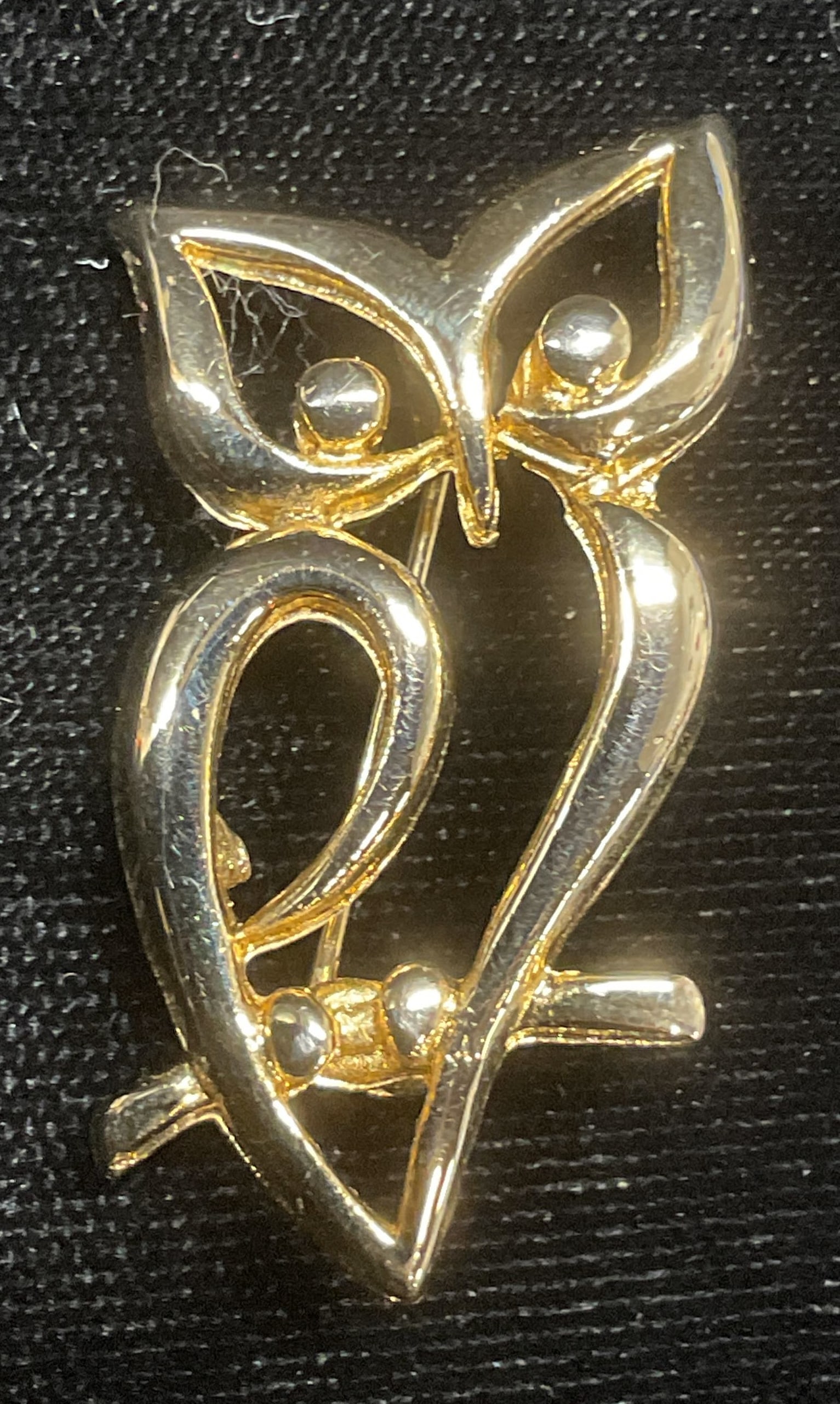 Gold Tone Perched Owl Brooch: Gold tone perched owl motif brooch. Measures approx 1.5 x .75 inches. Some wear including scratching observed. Jewelry, estate jewelry, costume jewelry, cocktail jewelry, fashion jewelry, accessories,