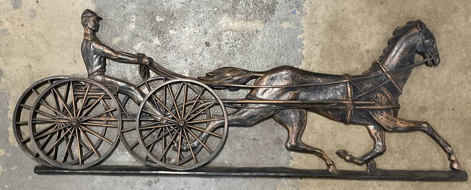 1962 Dart Ind Harness Horse Sulky Race Plaque 37in: Mid century 1962 Dart Ind bronze patina wall plaque. Sulky race harness horse and rider. Copyright date and trademarked on reverse. Plastic with bronze patina finish. Measures approx 37.5 x 14 inches.