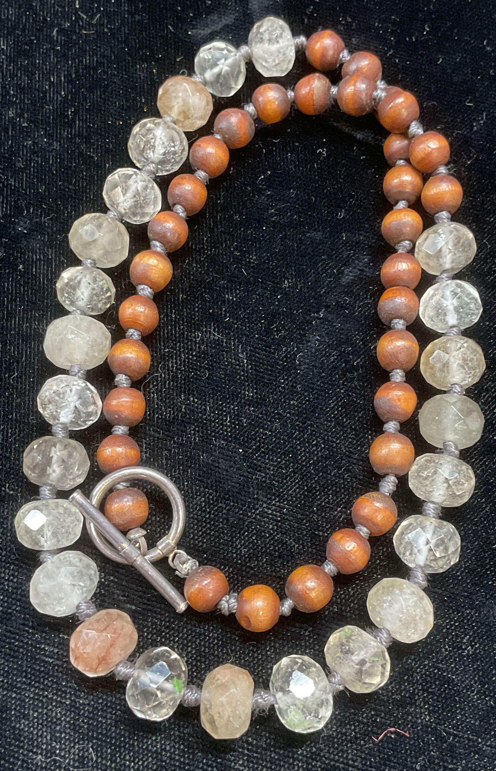 Vtg Semiprecious Stone & Wood Necklace: Vintage beaded necklace with clear semiprecious stones and wood on double knotted string. Drop length approx 9.5 inches. Some wear including scratching observed. Jewelry, estate jewelry, costume jewel