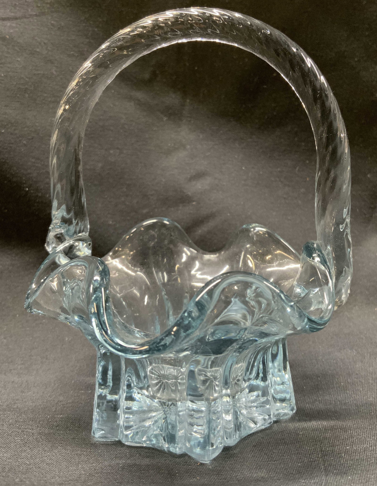 Vintage Collectible Blue Wavy Border Glass Basket: Vintage Light Blue Glass Basket. Vintage colored glass, collectible wavy border glass. Small glass basket with a twisted handle & a decorative wavy edge. Surface wear consistent with age, use & exposu