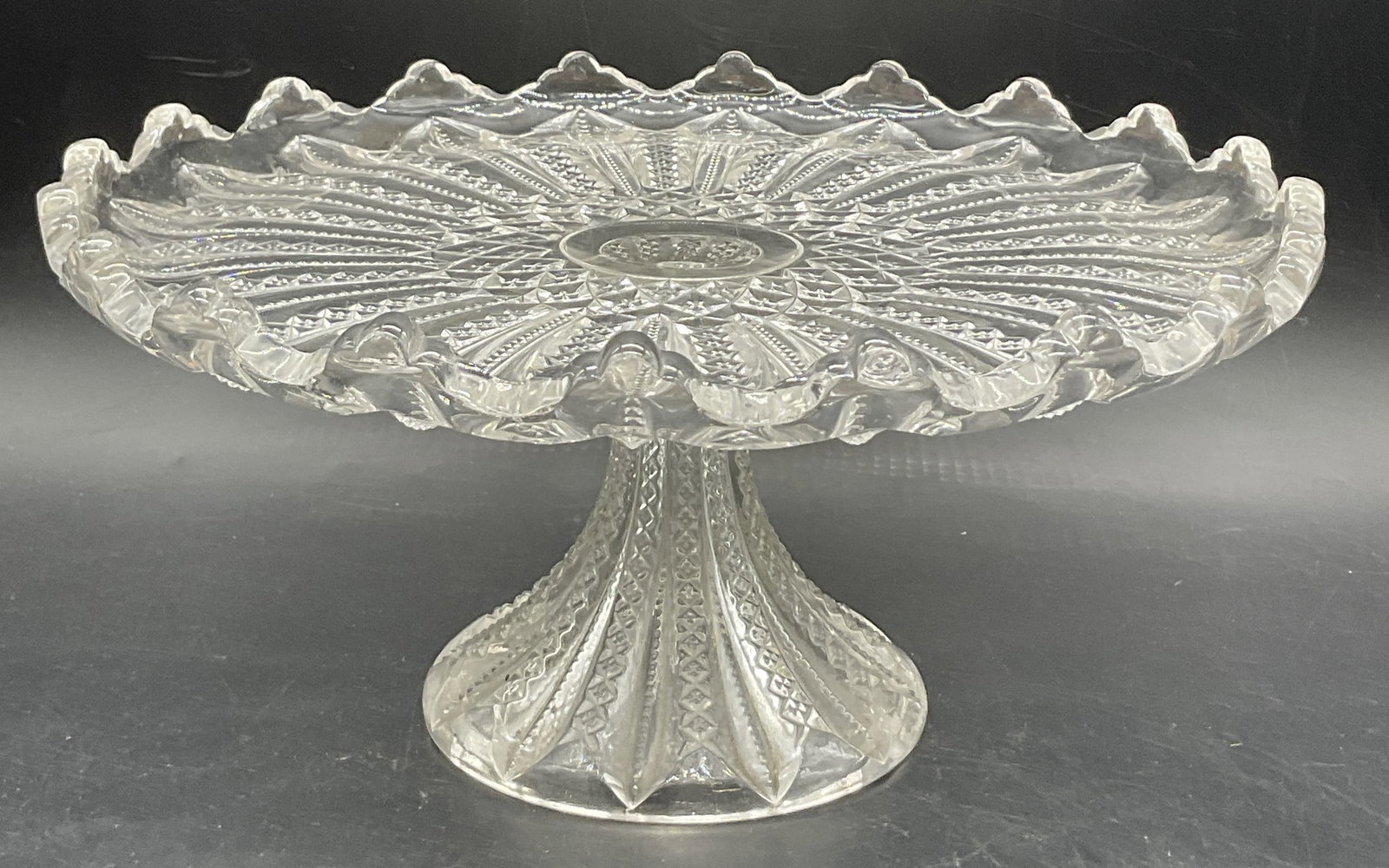 Vintage Cut Glass Pedestal Dish / Cake Dish: Vintage Cut Glass Pedestal Dish / Cake Dish. Measures approx. 4.25H x 10.25W in. Surface wear consistent with age, use, and exposure. home decor, home accents, homewares, housewares, home accessories,