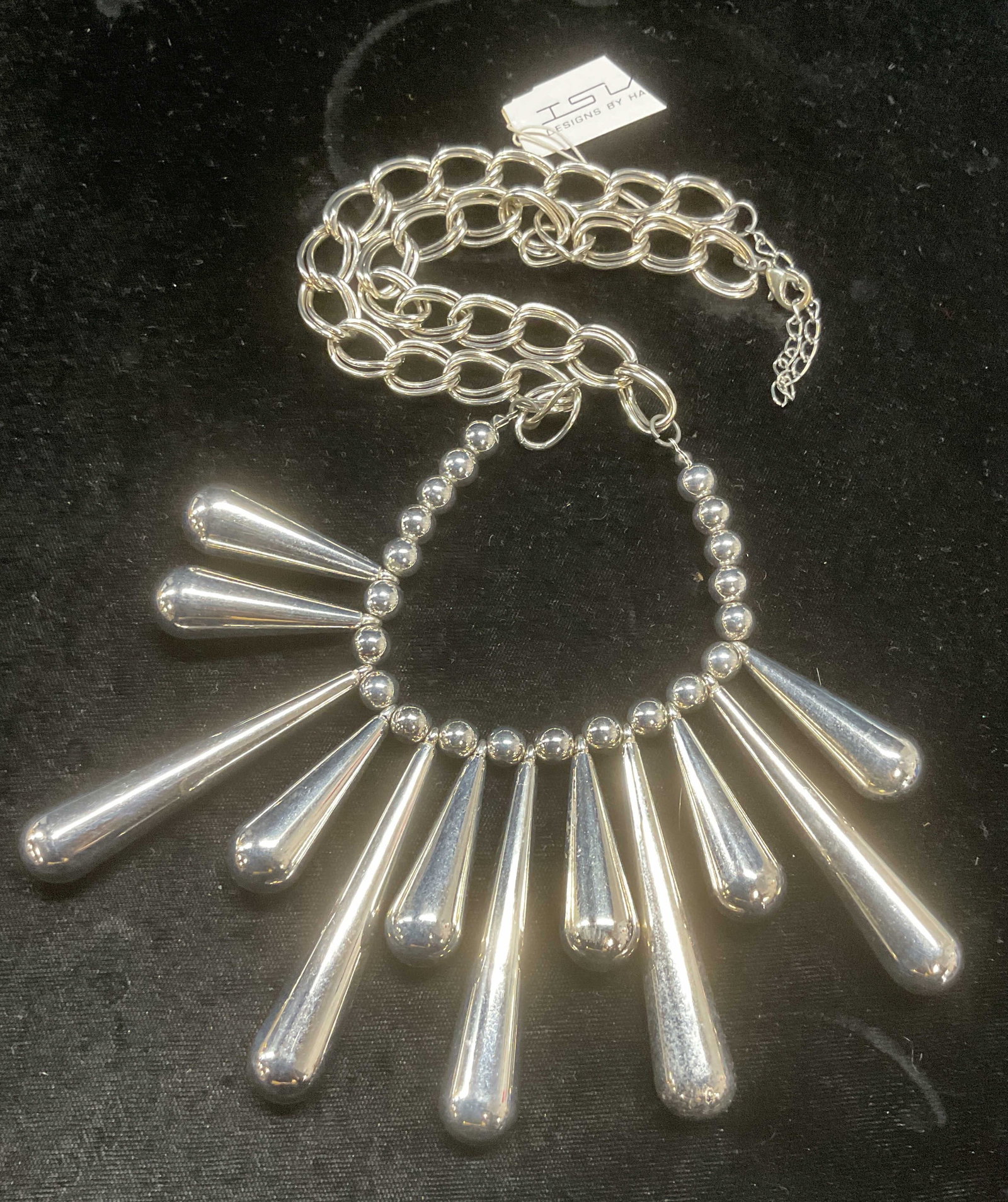 Island Designs Harry Haslett Silver Tn Necklace NWT: Island Designs by Harry Haslett silver tone necklace with drop pendants. Signed on tag. New with tag. Drop length approx 12 inches. Some wear including scratching observed. Jewelry, estate jewelry, co