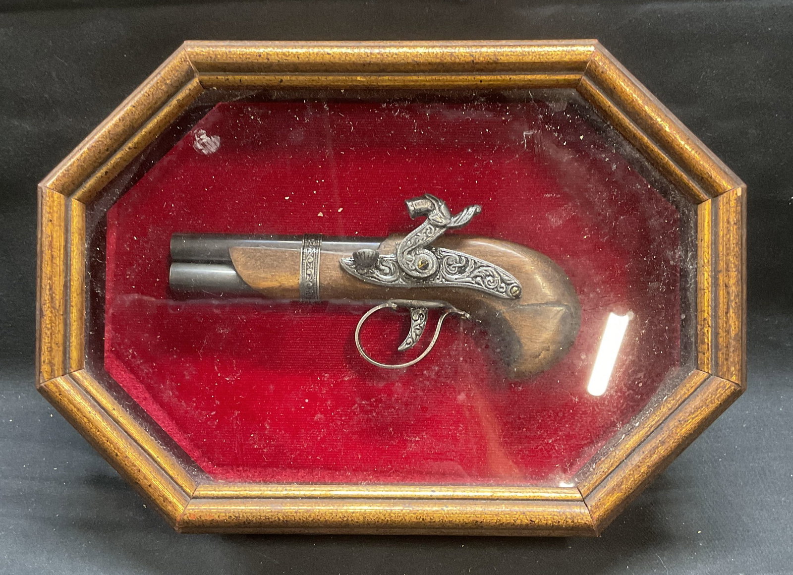 Vintage Derringer Style Pistol Shadowbox Display: Vintage Palmetto Derringer style pistol Shadowbox display. Replica pistol. Mounted on red velvet with gilt wood Shadowbox. Display measures approx 10 x 7 x 2 inches. Backing and frame not attached. Su