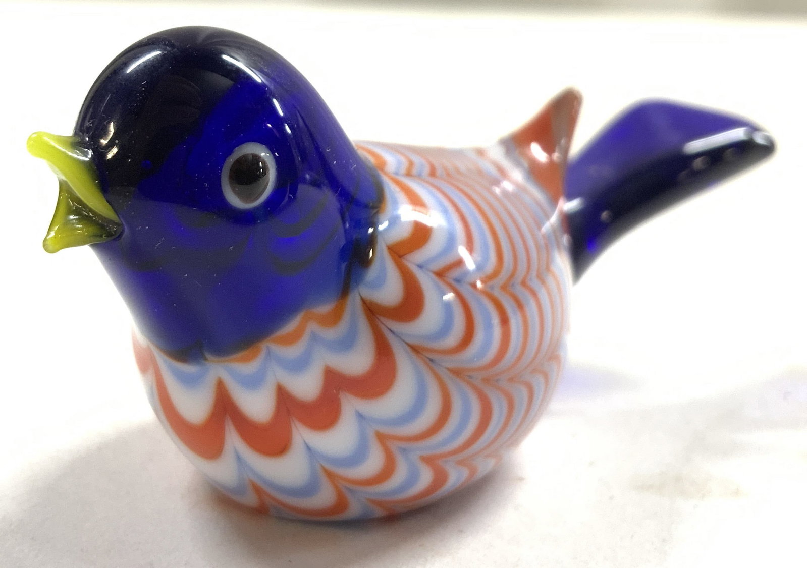 MURANO Vtg Art Glass Bird Figurine: Bird appears to be MURANO glass. (No apparent markings). Art glass bird is vintage. Piece has blue, white red and light blue toned detail with yellow beak. Bird figure measures approximately 2.75 inch