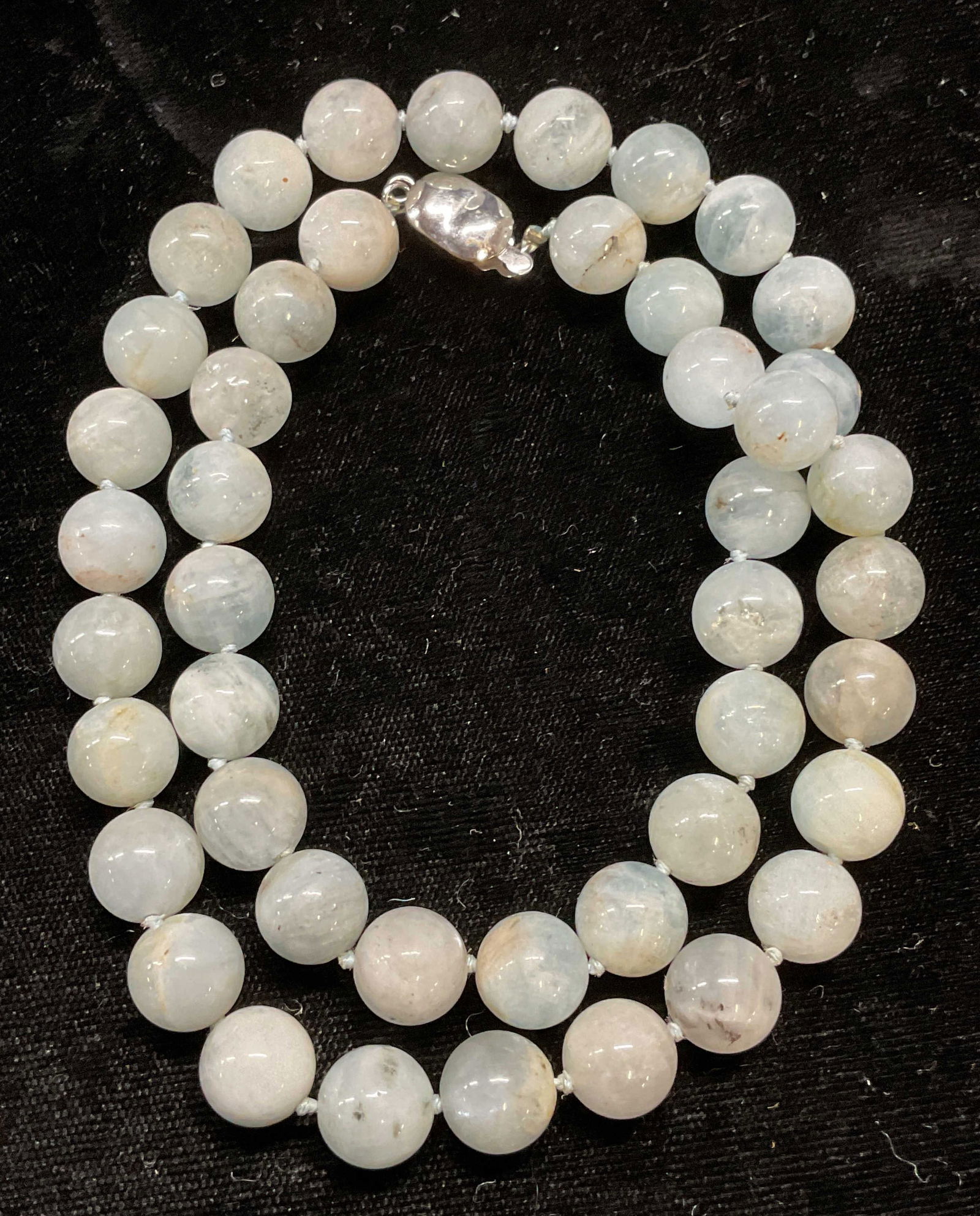 Vintage Blue Semiprecious Beaded Necklace: Vintage blue toned semiprecious stone beaded necklace on double knotted string. Drop length approx 9.5 inches. Some wear including scratching observed. Jewelry, estate jewelry, fine jewelry, cocktail