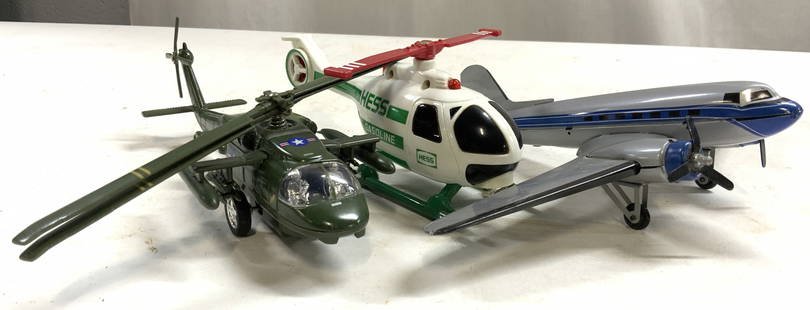 3 Toy Helicopters & Airplane, Hess, US Army & More: Lot includes 1 HESS toy helicopter, 1 United States Army toy helicopter, & toy airplane. Each piece appears to be plastic, plane appears to have some metal elements. Toy airplane measures approximatel