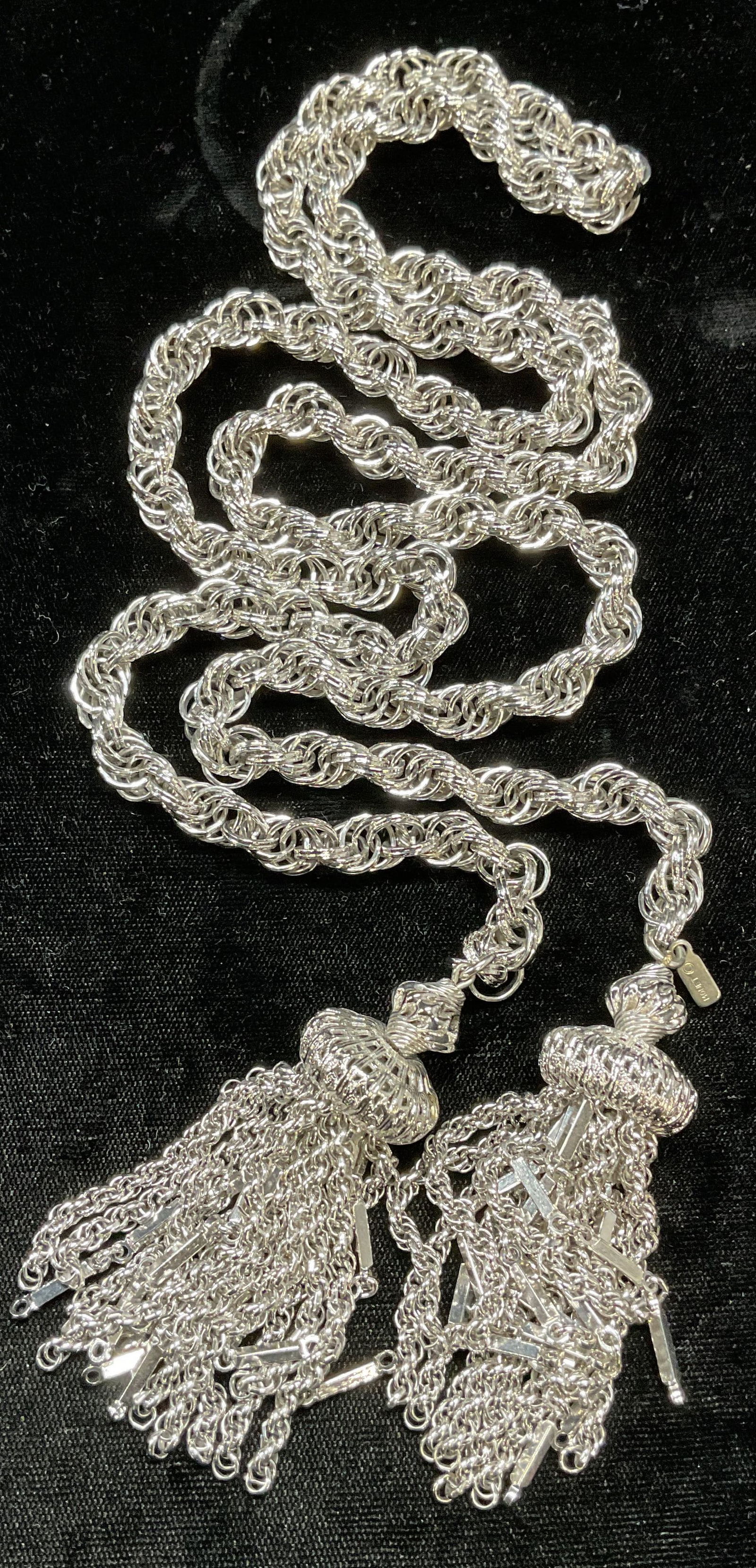 Monet Silver Tone Heavy Chain Lariat Necklace: Vintage Monet silver tone heavy chain lariat necklace with tassels. Signed on hang tag. Drop length approx 19 inches. Some wear including scratching observed. Jewelry, estate jewelry, costume jewelry,