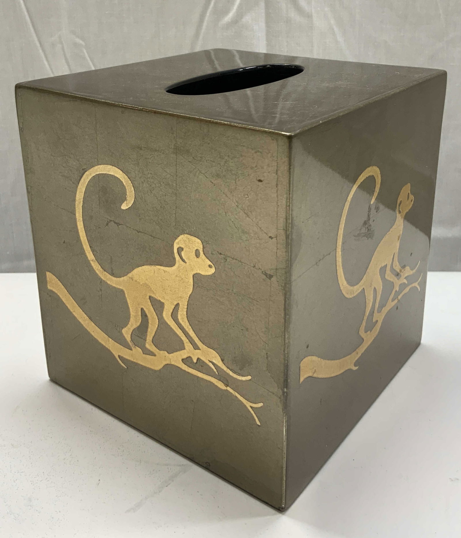 Vntg. Signed Monkey Composite Gold Tissue Box: Vntg. Monkey Composite Gold Tissue Box Gold color tissue box with monkey images on all 4 sides. The middle of the tissue box has an insert. Surface wear consistent to age, wear & exposure. Partial vis