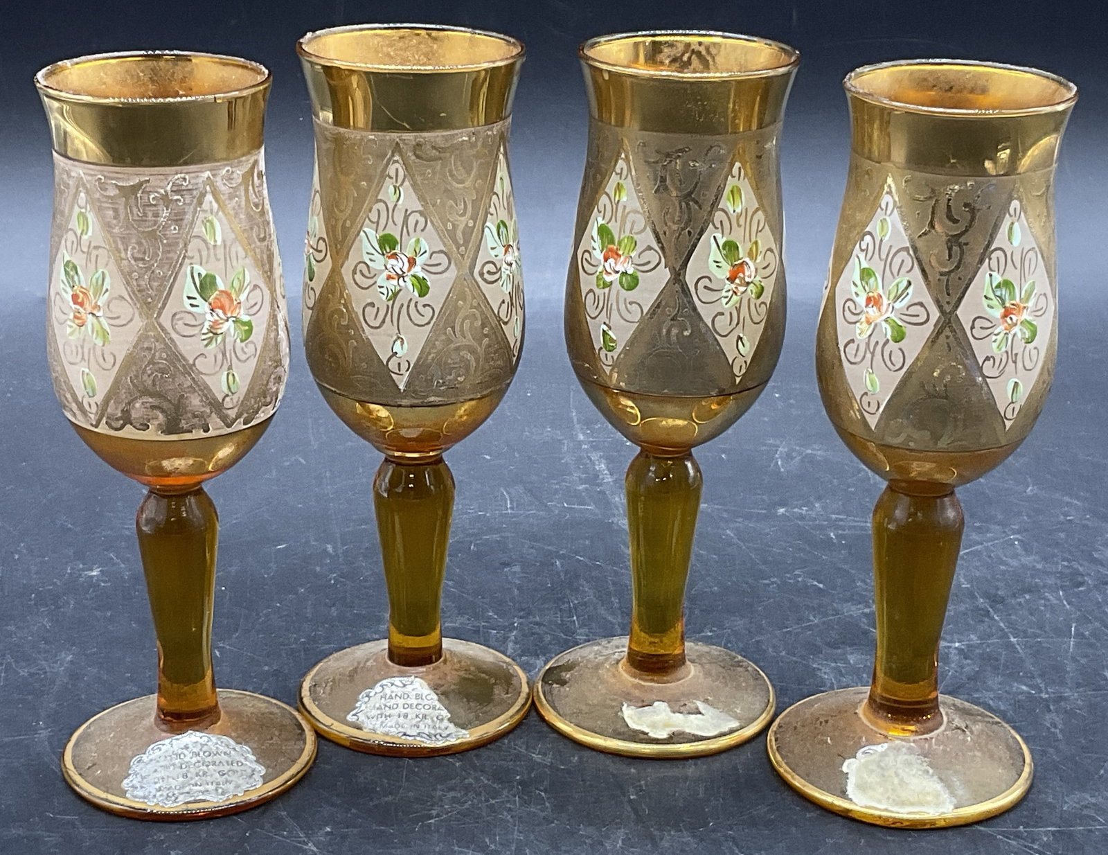 Set4 Vintage Hand Blown Italian Art Glass Stemware: Set of Four Vintage Hand Blown Italian Art Glass Stemware. Hand decorated with florals and geometric patterns. Stickers to the feet are some, can read HAND BLOWN HAND DECORATED WITH 18K GOLD, MADE IN 