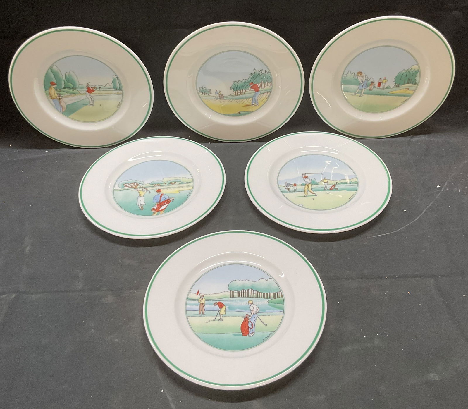 Set 6 APILCO Porcelain Golf Plates, France: Set of 6 APILCO porcelain plates with gold themed motifs. Each plate has unique design. All pieces signed on undersides. Made in France. Measure approx 7.5 inches wide each. All pieces have some wear