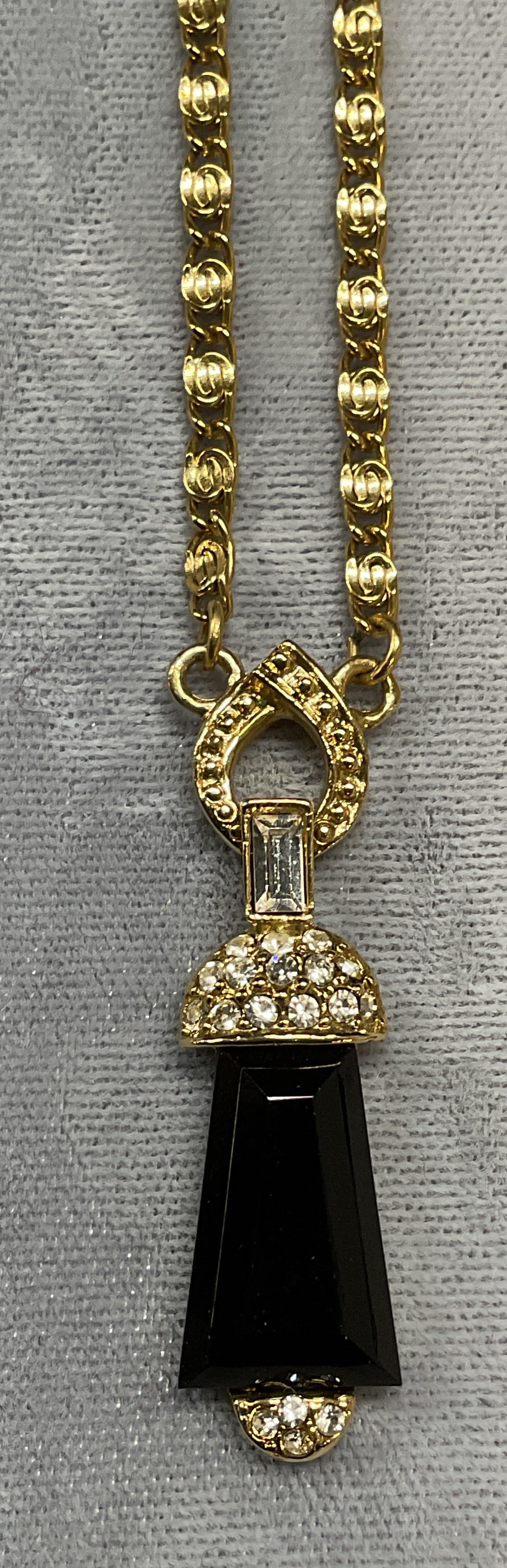 1928 Gold Tone Crystal Pendant Necklace: 1928 (designer) gold tone crystal pendant necklace. Signed on hang tag. Drop length approx 8 inches. Some wear including scratching observed. Jewelry, estate jewelry, costume jewelry, cocktail jewelry