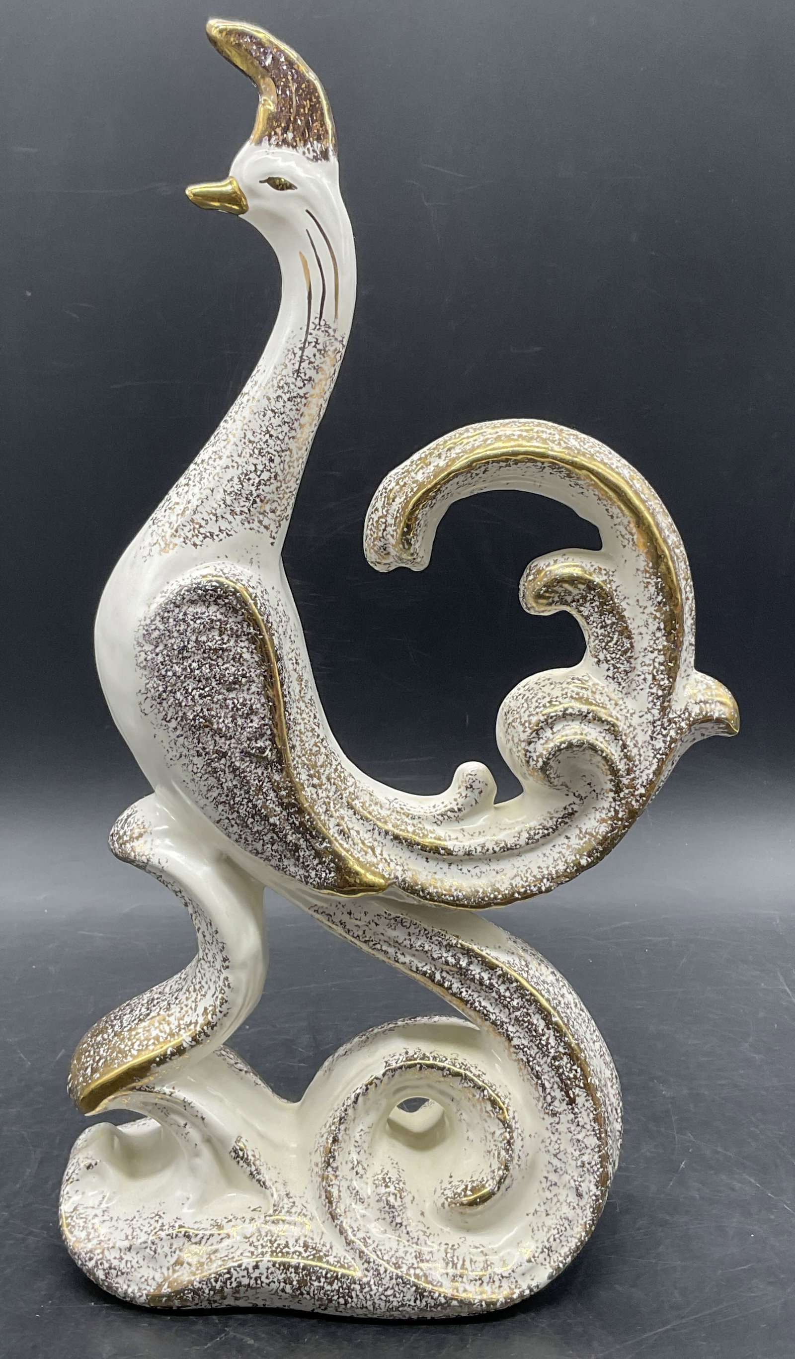 Vintage Mid Century Pottery Peacock Figural: Vintage Mid Century Pottery Peacock Figural. Gilt detail to the piece. Measures approx. 13.25Hx 6W in. Pitting, discoloration, and crazing present. home decor, home accents, homewares, housewares, hom