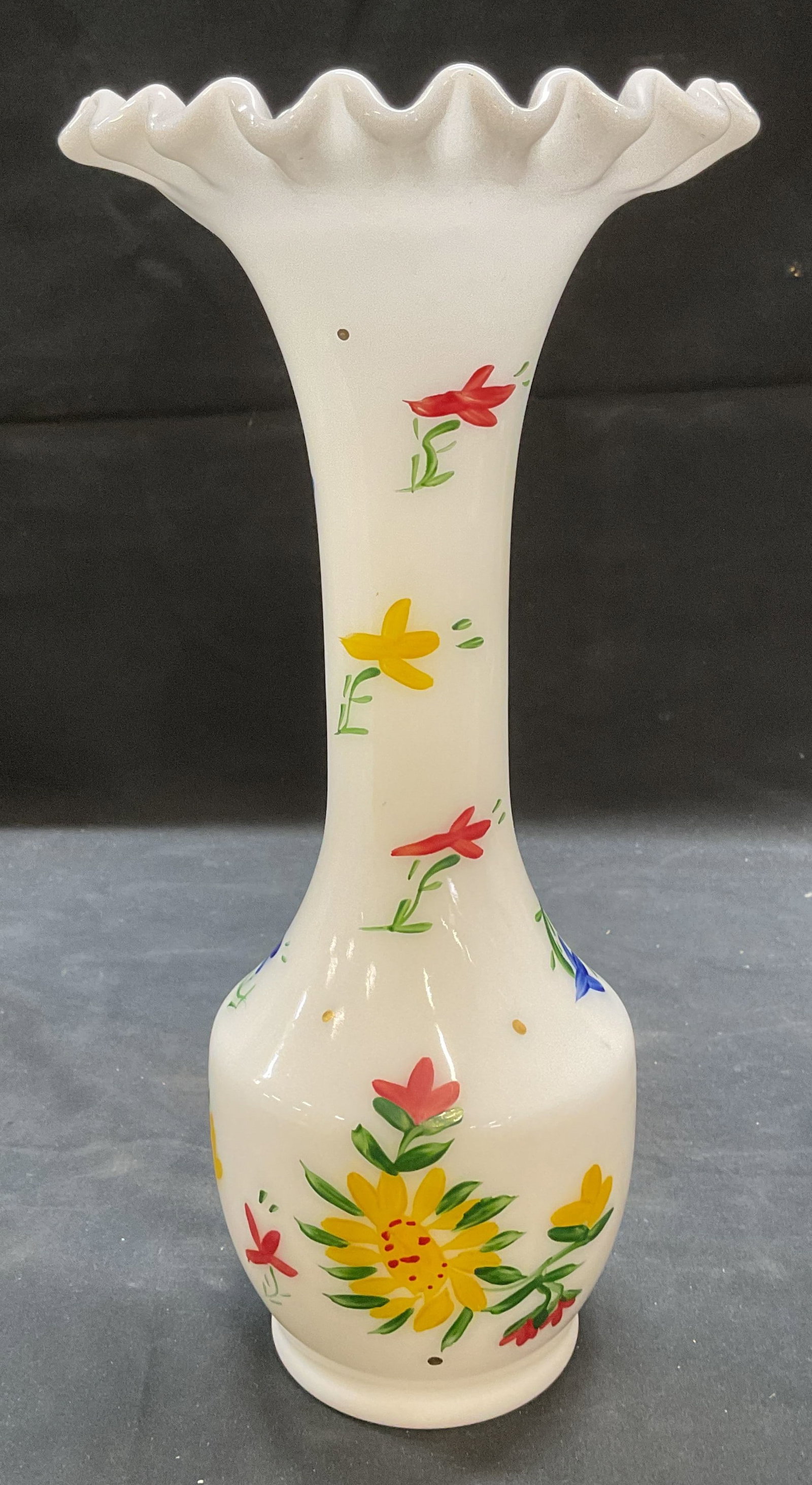 Milk Glass Hand Painted Floral Handkerchief Vase: Vintage milk glass vase with handkerchief rim. Hand painted colorful floral motif. Measures approx 5 x 10.5 inches. Some wear consistent with exposure. Milk glass, milk glass vase, handkerchief vase, 