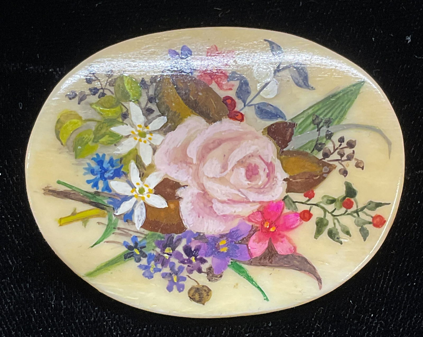 Vtg L Jan Hand Painted Floral Bone Brooch: Vintage signed L Jan hand painted bone brooch with floral motif. Signed on underside. Measures approx 2 x 1.75 inches. Some wear including scratching observed. Jewelry, estate jewelry, costume jewelry