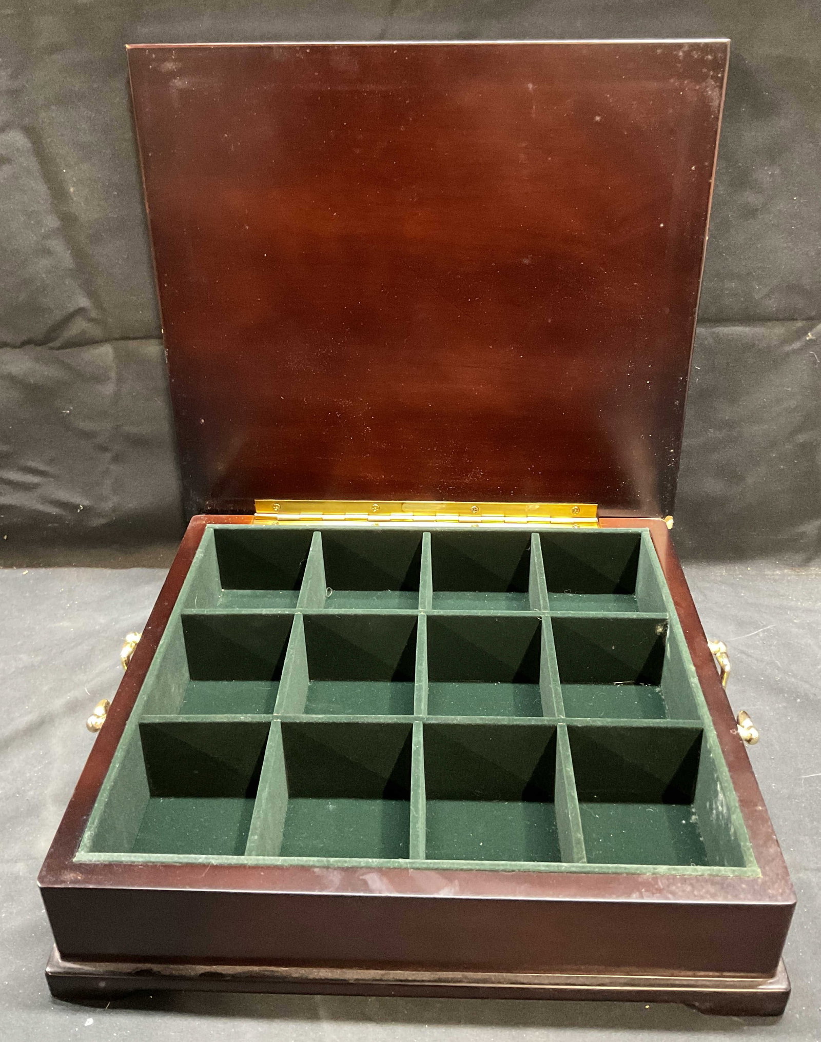 Bombay Heavy Wooden Lidded Tea Chest: Bombay heavy dark finish wooden tea chest. Hinged lid. Handles. Interior compartments. Signed on underside. Measures approx 12.5 x 11.5 x 3.75 inches. Some scratching observed. Bombay, Bombay chest, B