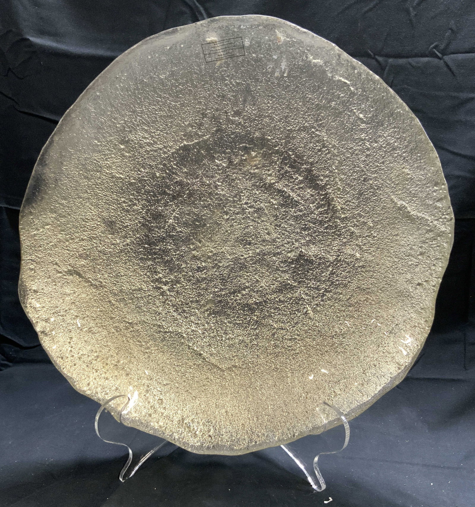Foil Art Glass Centerpiece Bowl: Bowl has silver toned foil style detailing. Bowl is glass. Piece has irregularly formed rim. Bowl measures approximately 16.5 inches wide 2.5 inches tall. Bowl, glass bowl, glass centerpiece bowl, cen