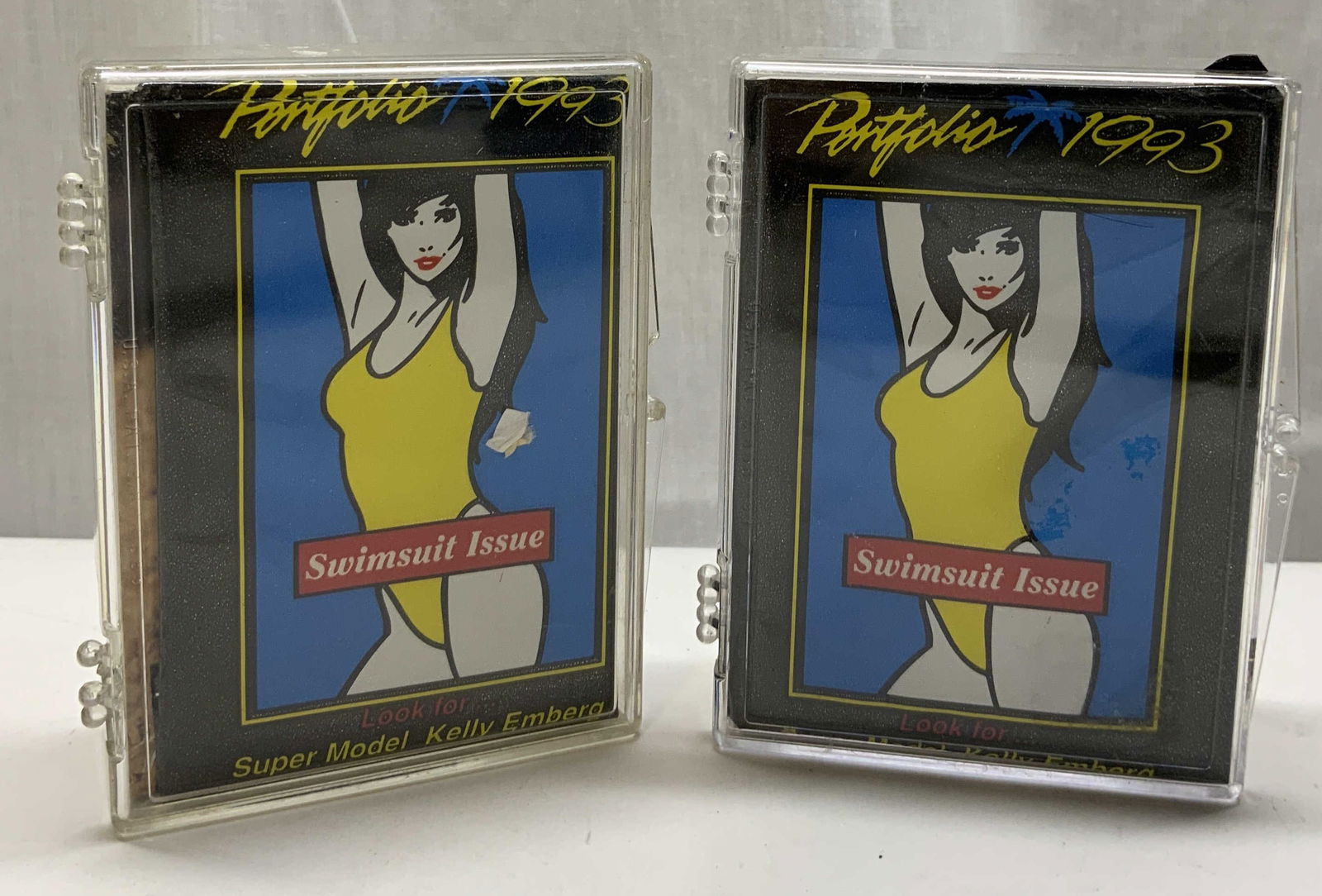 Group Lot Portfolio 1993 Swimsuit Issue CARDS: Group Lot Portfolio 1993 Swimsuit Issue CARDS A group lot of Portfolio 1993 Swimsuit issue trading cards. Plastic container is holding cards inside. Trading cards have images of super models. Not indi