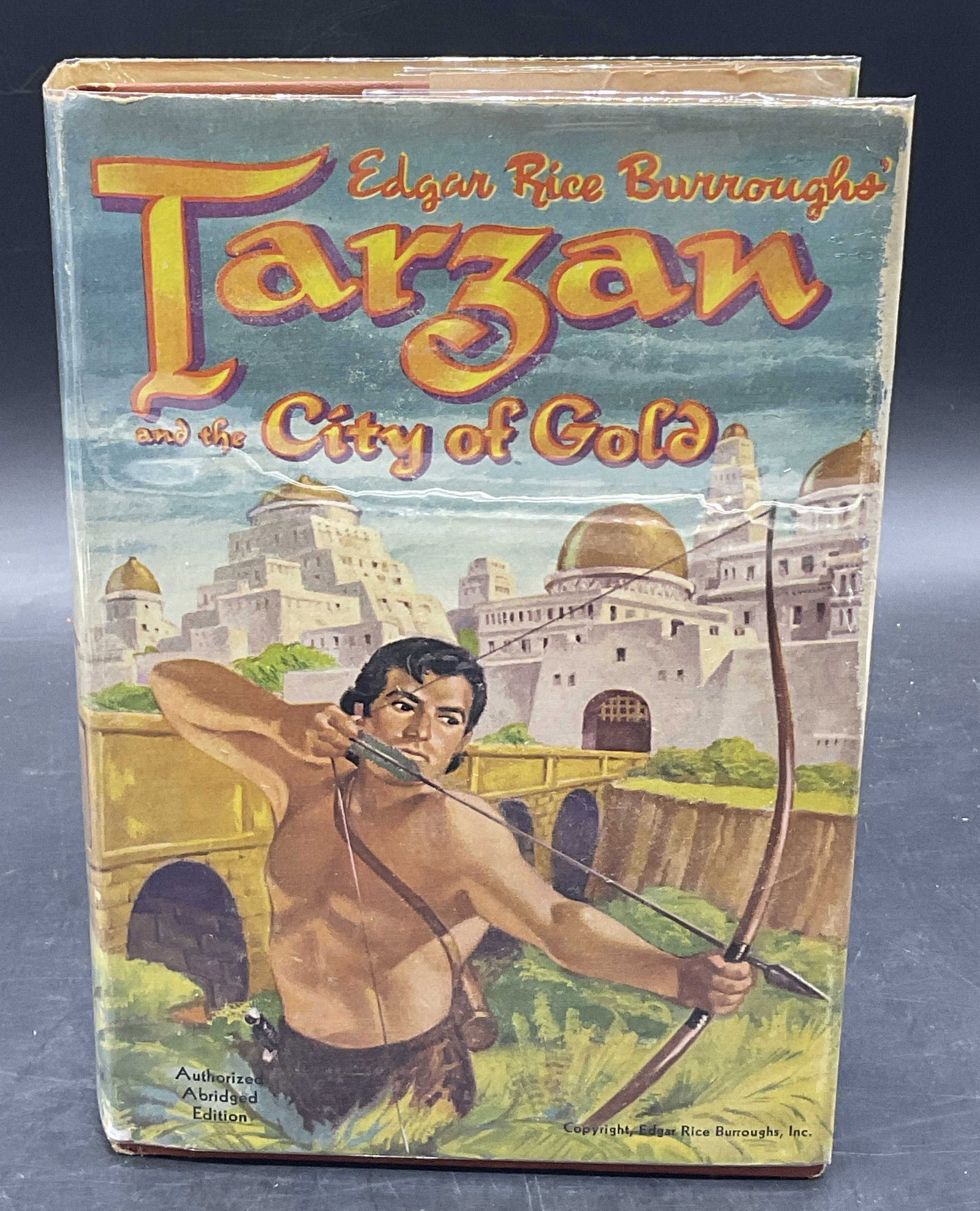 1952 TARZAN CITY OF GOLD Edgar Rice Burroughs: TARZAN AND THE CITY OF GOLD by Edgar Rice Burroughs illustrated hardcover book. Illustrated by JESSE MARSH, Authorized Abridged Edition, WHITMAN PUBLISHING COMPANY RACINE, WISCONSIN. C.1952. Measures 