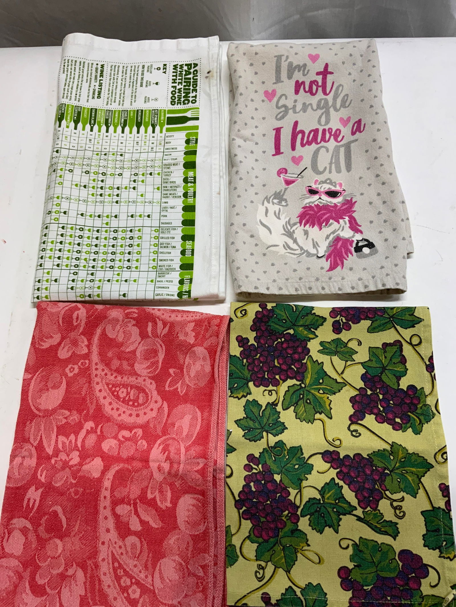 Lot 4 MARHA BLANKE Decorative Kitchen Towels: Lot 4 MARHA BLANKE Decorative Kitchen Towels 1 grapes with leaves kitchen towel pattern, has tag that reads by MARHA BLANKE. 100% cotton. Pink floral pattern kitchen towel, tags reads 100% cotton. Lig