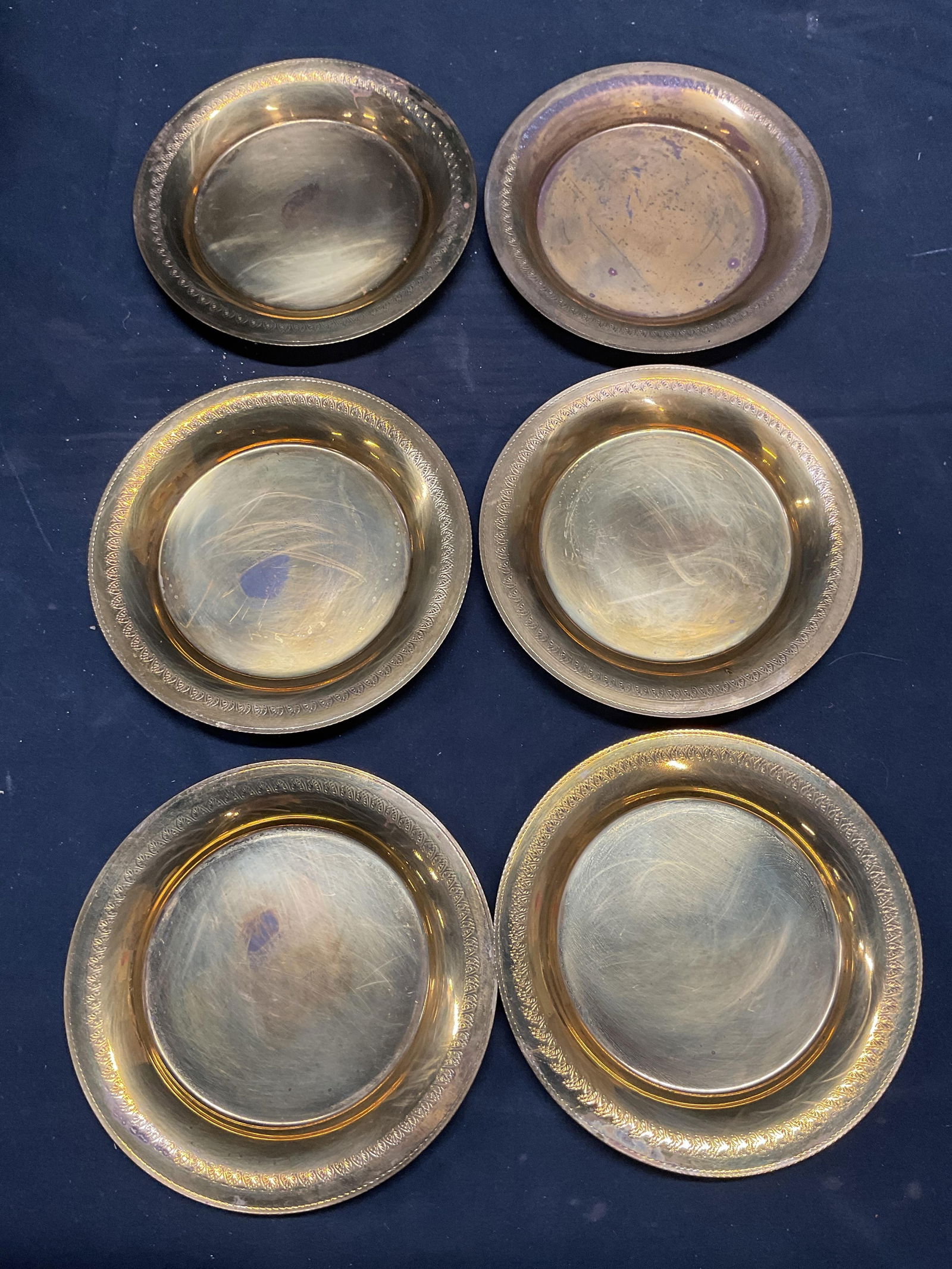 Set 12 Vintage Brass Plates: Set of 12 vintage brass plates. Measure approx 4.5 inches wide. All pieces have some wear including scratching and patina. Brass plates, vintage brass plate, tableware, table accessories, homewares, h