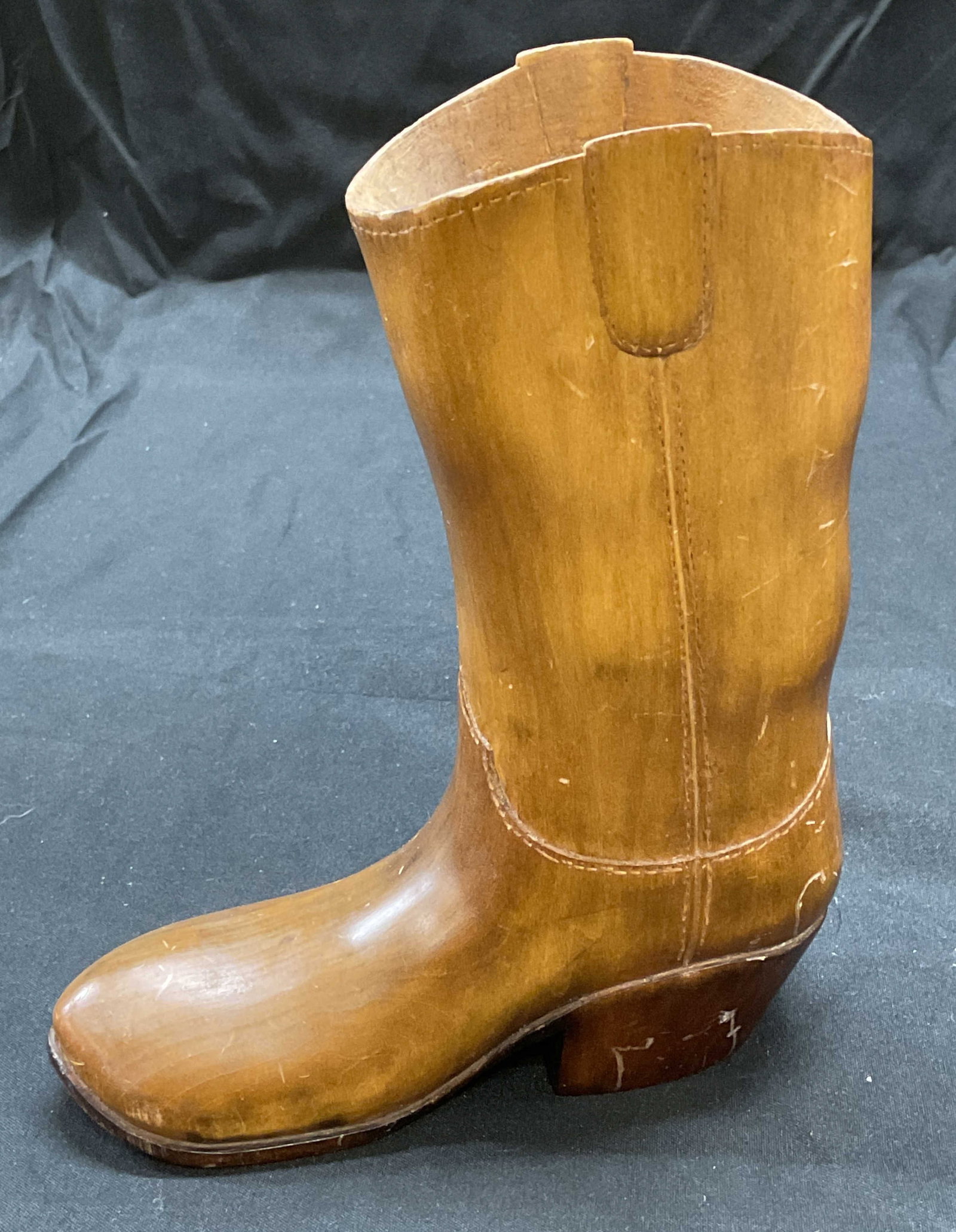 Carved Wood Cowboy Boot Figural Vessel: Carved wood cowboy boot figural vessel or vase. Measures approx 5.5 x 2 x 6.75 inches. Some wear including scratching observed. Cowboy boot, cowboy boot figural, wood cowboy boot, wood boot, boot figu