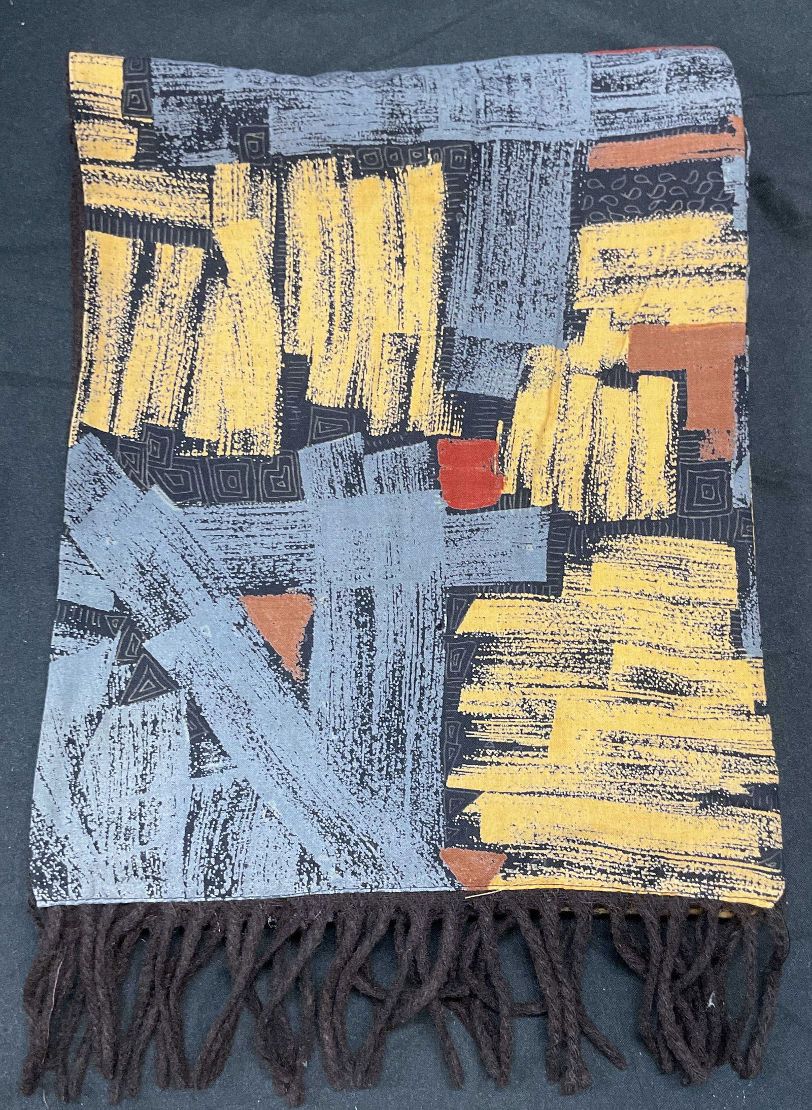 Gin Mode P Erbe Wool Silk Abstract Print Scarf: Vine Mode P. Erbe Mantova scarf with abstract print in grey, yellow, red. Wool reverse, outer feels like silk. Measures approx 54 inches long. Some pulls, holes, and blemishes observed. Gin mode scarf
