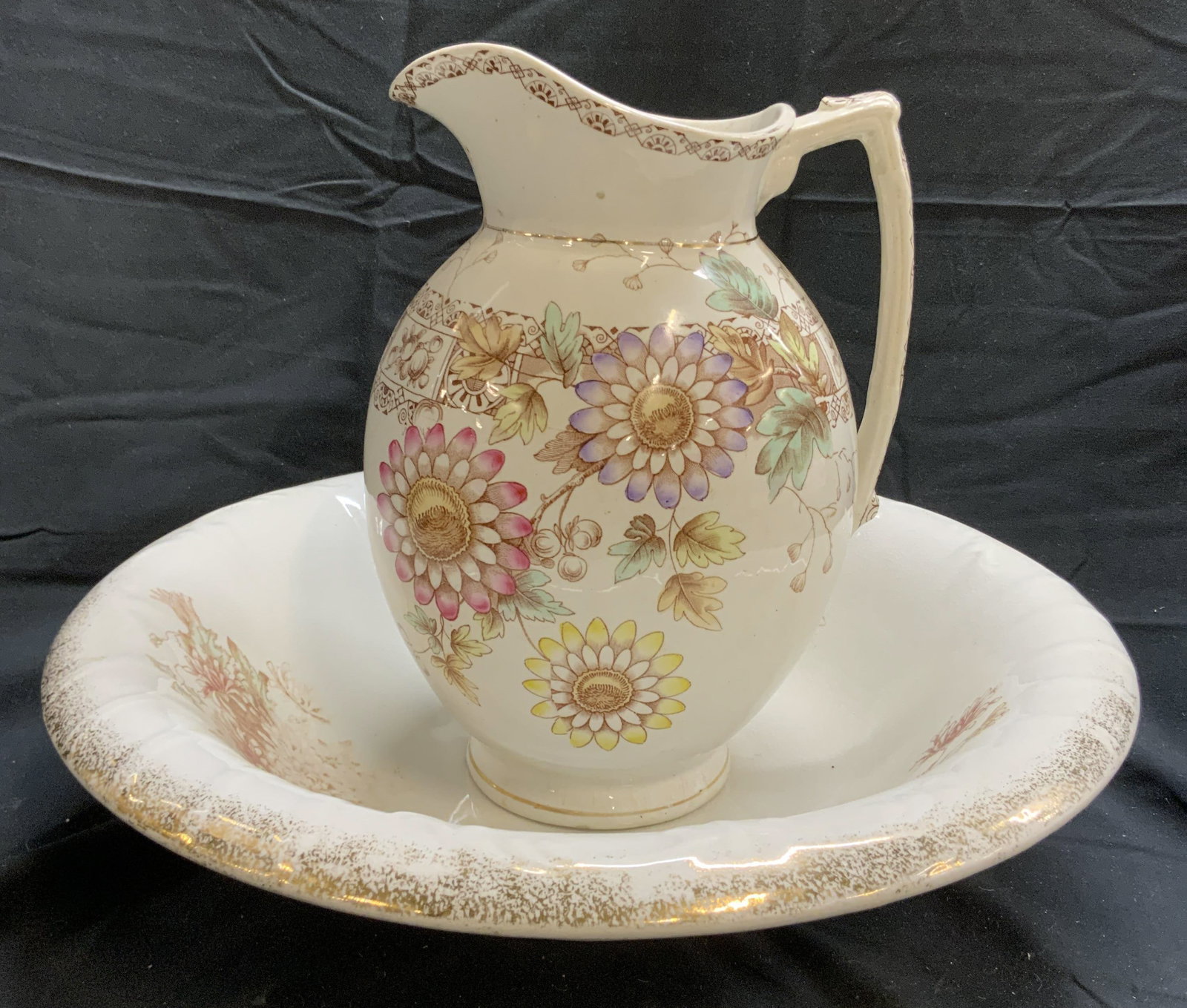 MELLOR & CO ETRURIA Vtg Prc Pitcher & Wash Basin: Underside of Wash basin reads MELLOR & CO ETRURIA. Lot includes 2 pitcher and 1 wash basin. Each piece is porcelain. Pieces each have multi toned intricate floral and leaf detail. Wash basin measures 