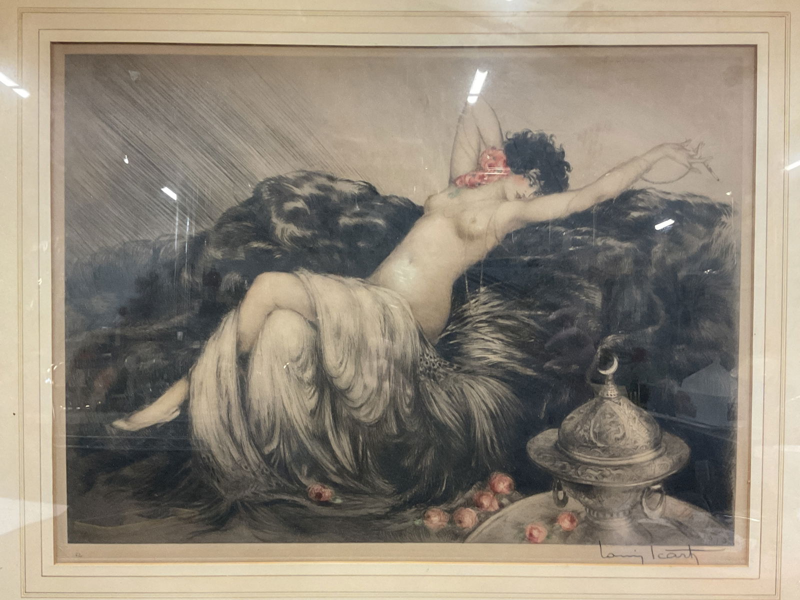 Signed Louis Icart Reclining Nude Etching: Framed and matted colored etching and drypoint print on paper. Signed at lower right, Louis Icart. Stamp reading Paris on left hand lower corner. Reclining nude woman on fur holding a cigarette, weari