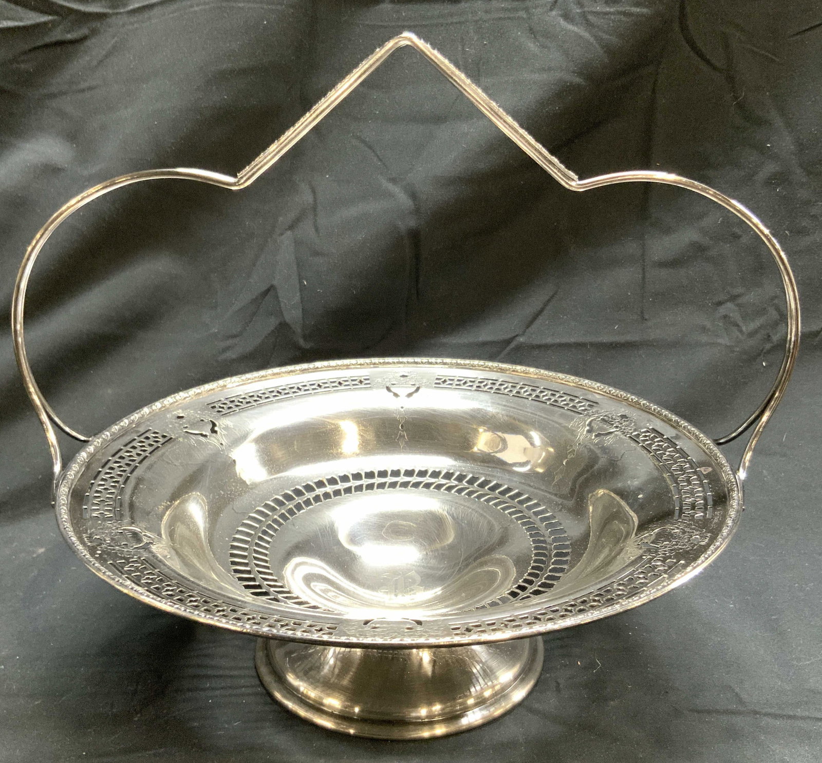 SHEFFIELD Nickel Silver Footed Vessel W Handle: Underside is inscribed SHEFFIELD MADE IN USA NICKEL SILVER. Vessel is footed. Piece has pierced geometric detail. Vessel has handle. Center is monogrammed with letter R. Appears to be vintage. Piece m