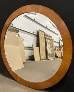 BAKER FURNITURE XL Round Wooden Wall Mirror: BAKER FURNITURE XL Round Wooden Wall Mirror. Weighty. Metal hardware to reverse. Tag to reverse reads BAKER FURNITURE. Measures approx. 40L x 40W in. Surface wear and chipping present. Loose pieces. P