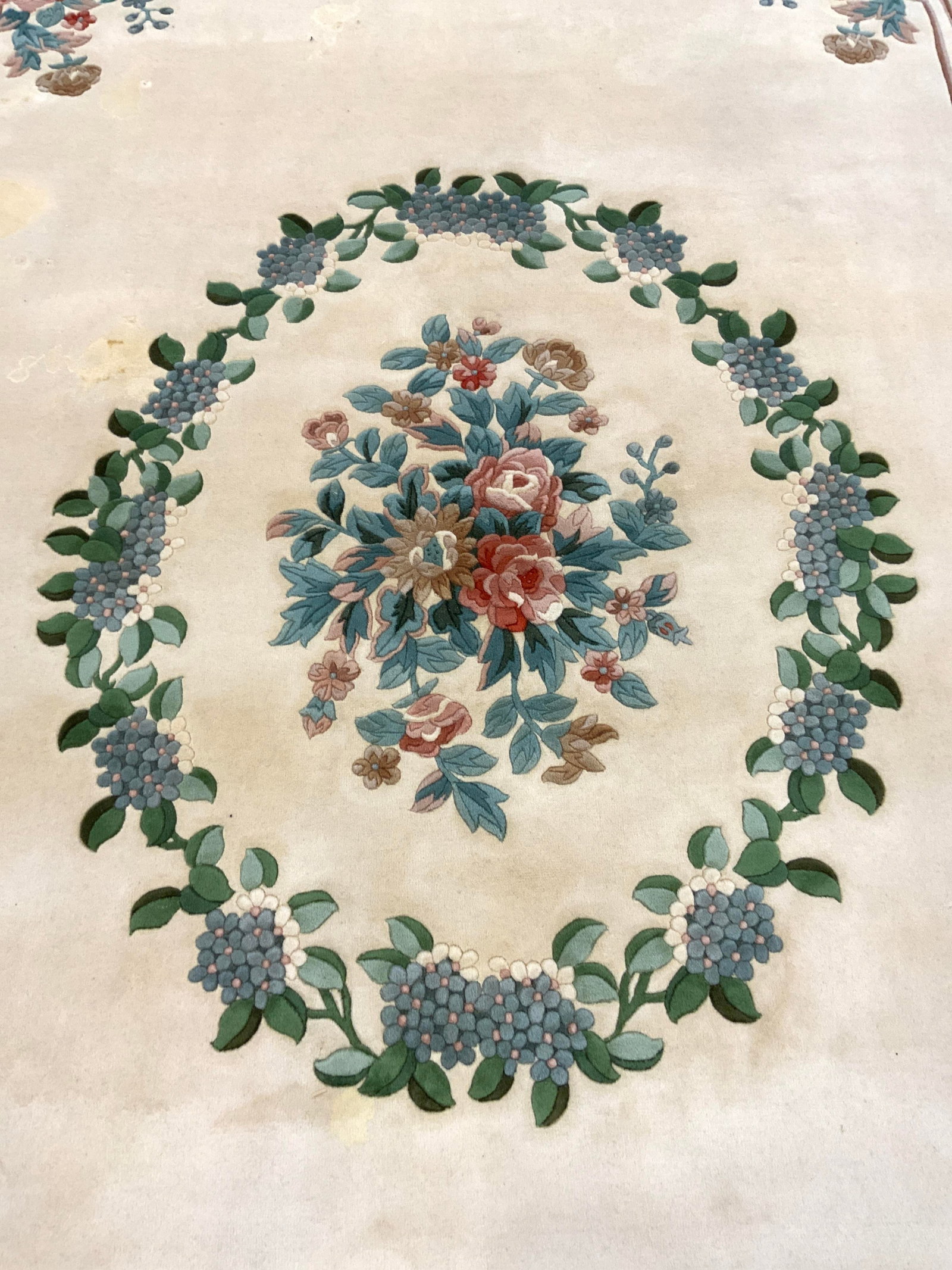 Vtg H Made Ch Art Deco Fringed Wool Pile Ovrsz Rug: Rug is hand made and wool pile. Piece is oversized. Rug has intricate multi toned floral and leaf detail. Piece has cream toned fringes at edges. Rug measures approximately 170 inches long 112 inches