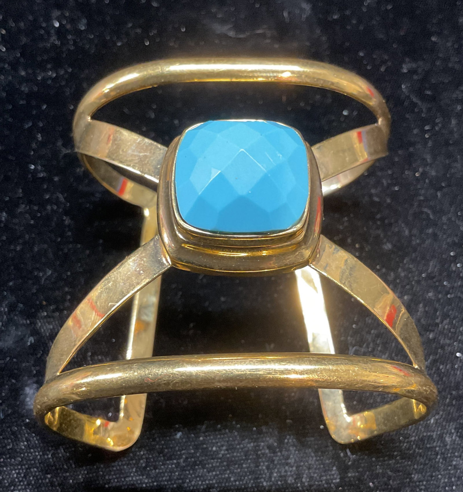 Gold Tone Turquoise Crystal Cuff Bracelet: Vintage gold tone open cuff bracelet with turquoise crystal. Measures approx 2.25 inches wide. Some scratching observed. Jewelry, estate jewelry, costume jewelry, cocktail jewelry, fashion jewelry, ac