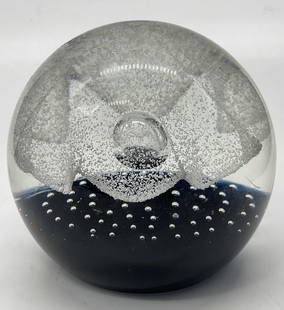 CAITHNESS SCOTLAND Controlled Bubble Paperweight: CAITHNESS SCOTLAND Controlled Bubble Art Glass Paperweight. Colorless glass featuring a purple floral and bubbles to the interior. Underside sticker reads CAITHNESS SCOTLAND. Measures approx. 2.5H x 2