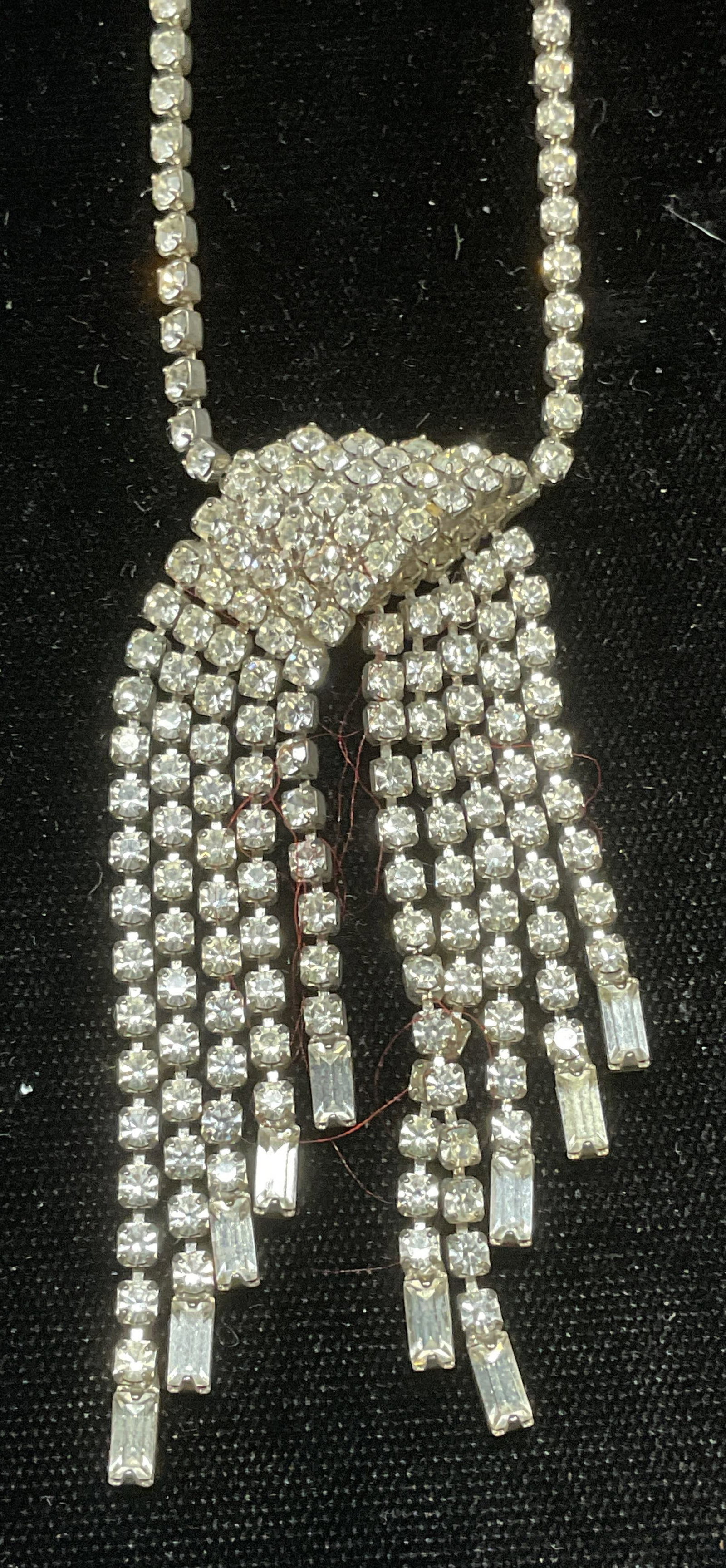 Vintage Silver Tone Crystal Pendant Necklace: Vintage silver tone colorless crystal pendant necklace. Drop length approx 8 inches. Pendant approx 2.5 inches long. Some scratching observed. Jewelry, estate jewelry, costume jewelry, cocktail jewelr