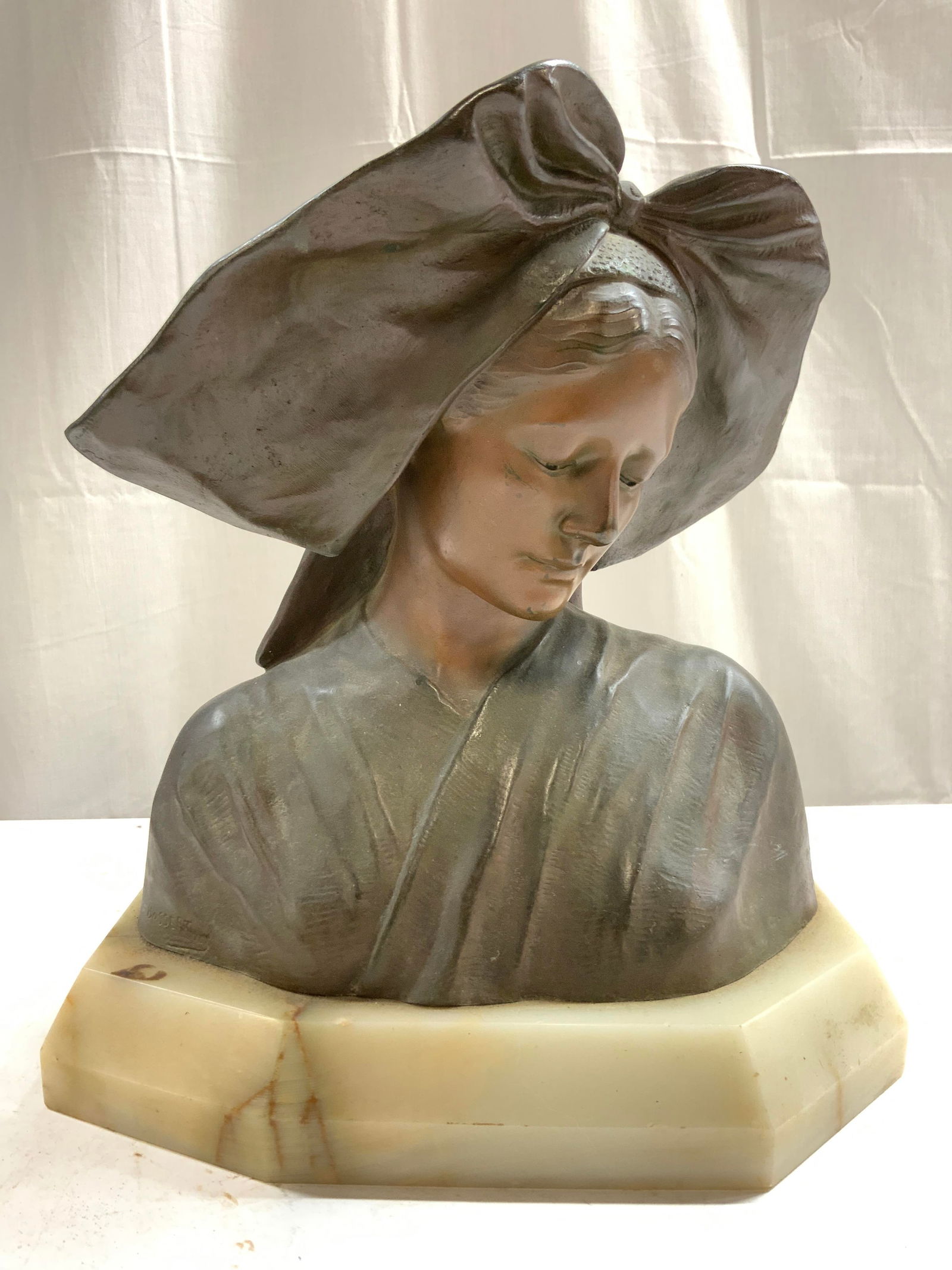 LOUIS ALINE LOUTH BOSSERT Brnz Fem Bust on Marble: Left side is signed BOSSERT. Depicts bust of a female figure wearing a bonnet. Piece appears to be bronze and has significant weight. Bust has cream toned marble base. Piece appears to be vintage. Bus