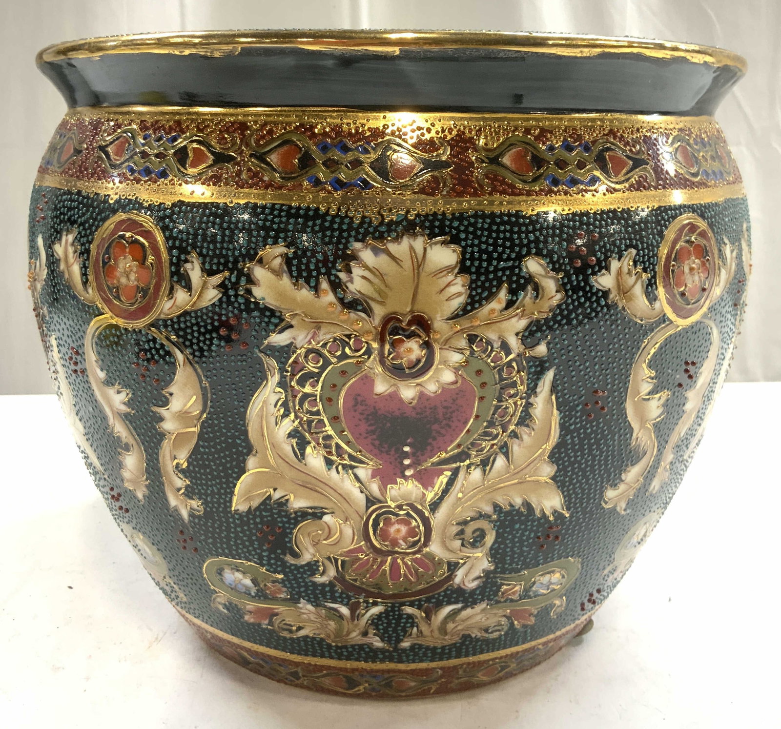 Vtg Hand Painted Asian Porcelain Fishbowl Planter: Planter is hand painted and porcelain. Piece appears to be vintage. Planter has fishbowl form. Interior has painted koi fish Detail. Piece has intricate multi toned floral, leaf, geometric & gilt deta