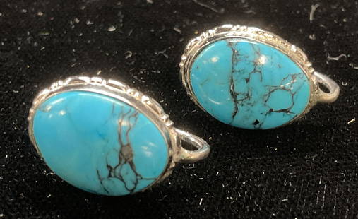 Vintage Sterling Silver & Turquoise Earrings: Vintage sterling silver earrings with turquoise stones. Marked sterling. Measure approx .75 x .5 inches. Total weight 6.7 grams. Some wear including scratching observed. Jewelry, estate jewelry, fine