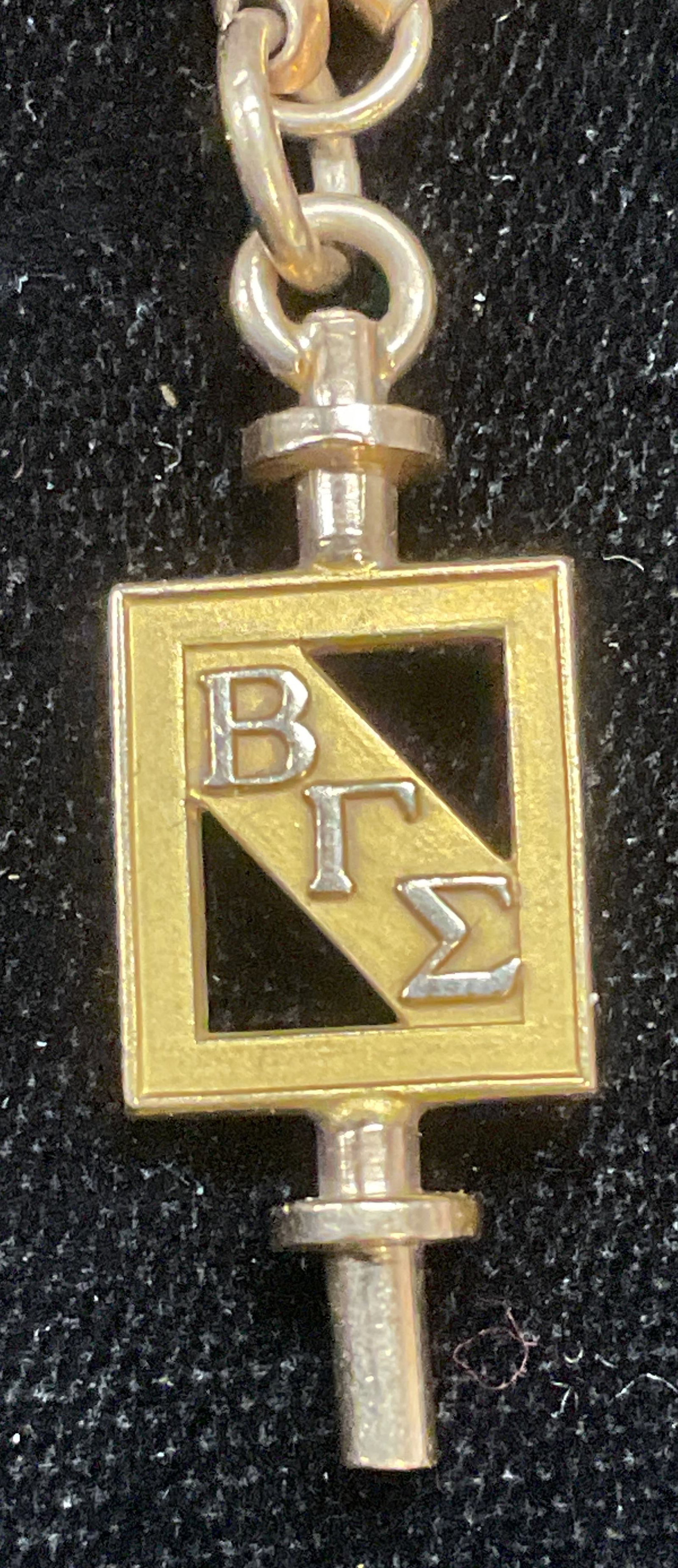 1961 10k Gold Univ. Miami Sorority Pendant: Vintage 1961 10k gold University of Miami sorority pendant. Engraved and dated on reverse. Signed with makers marked. Pendant measures approx 1 1/8 x 3/8 inches. Attached to 12k gold filled chain brac