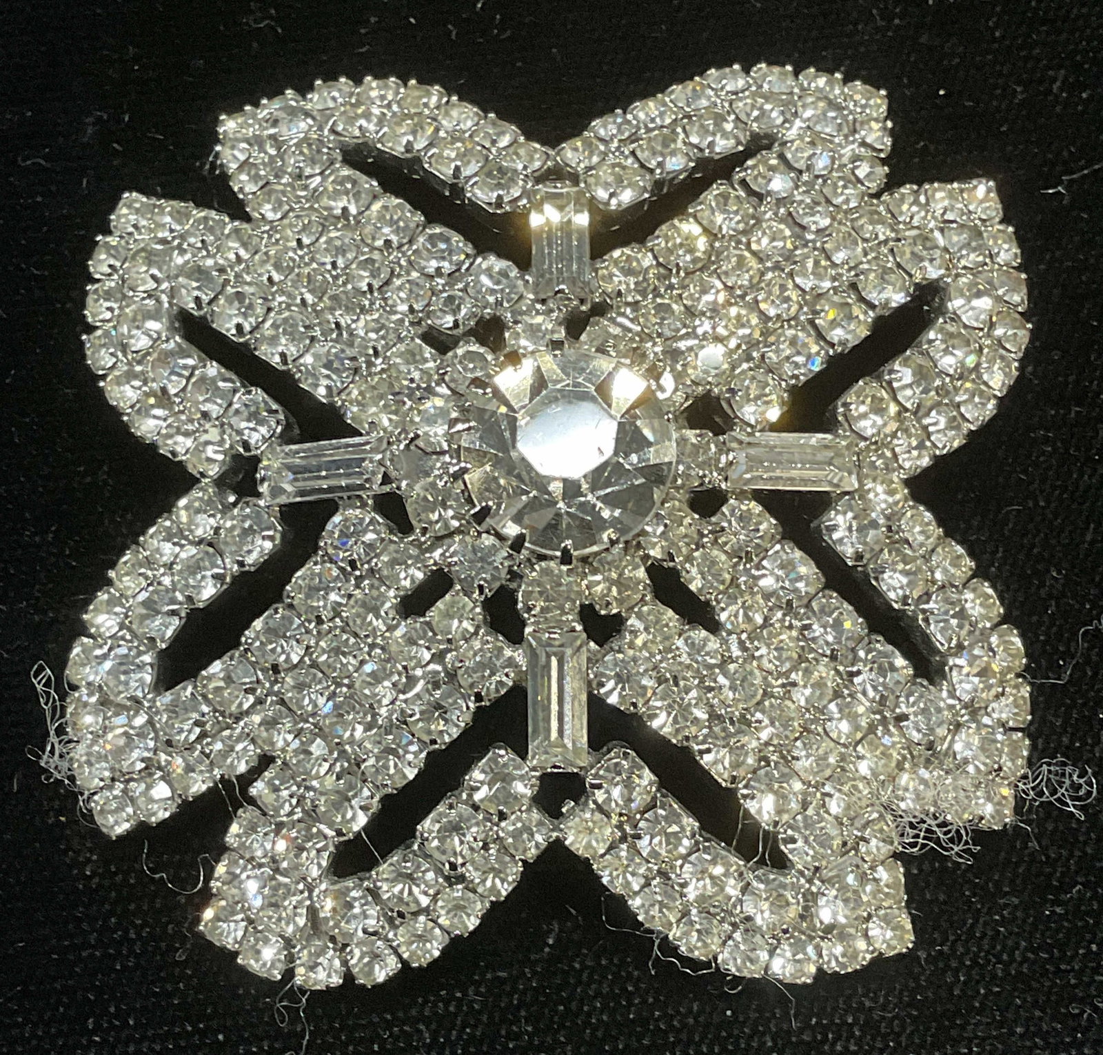 Vintage Silver Tone Crystal Flower Brooch: Vintage silver tone crystal flower motif brooch. Measure approx 2 x 2 inches. Some wear including scratching observed. Jewelry, estate jewelry, costume jewelry, cocktail jewelry, fashion jewelry, acce