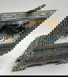 916 Silver Cloisonne Enamel Huntsman Trinket Box: 916 Silver Cloisonne Enamel Huntsman Motif Trinket Box. Handles to the sides. Huntsman atop a horse to the lid. Lid opens with hinge hardware. Trademarks to underside read AH, 88, and two feature head