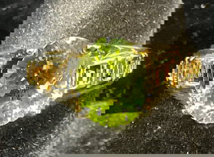 Signed 14k Yellow Gold Semiprecious Ring: Signed 14k yellow gold ring with pierced key pattern band and green semiprecious stone. Marked 14k. Signed illegibly. Ring size 7. Total weight 3.8 grams. Includes box. Some wear including scratching
