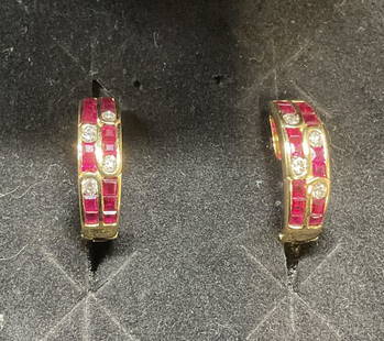 18k Yellow Gold Diamond Semiprecious Earrings: 18k yellow gold earrings with diamond accents and red semiprecious stones. Marked 18k. Measure approx .5 inches long. Total weight 4.3 grams. Includes box. Some wear including scratching observed. Jew