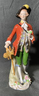 SITZENDORF DRESDEN Porc Huntsman Figural Germany: SITZENDORF DRESDEN Porcelain Huntsman FiguralPorcelain figural depicting a gentlemen wearing 18th century attire. Gentlemen is standing & is wearing a red coat with gold detailing. On his right arm, h